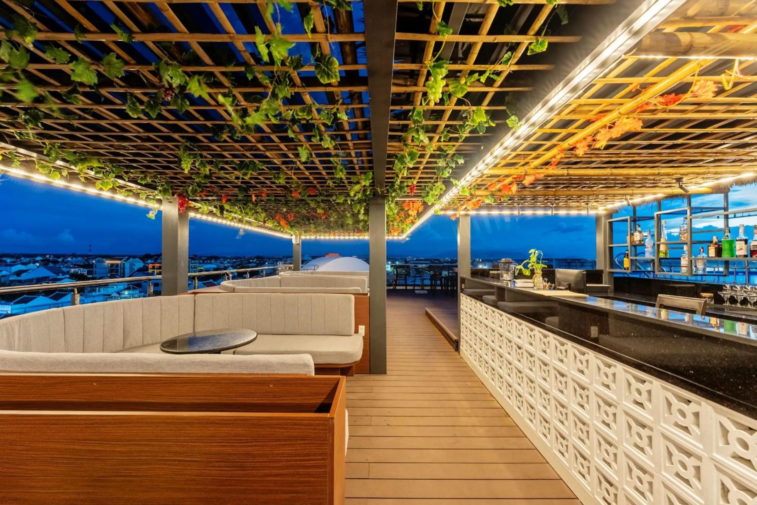 Seating area in Qualia De Hôtel Hoi An - Rooftop Bar City View