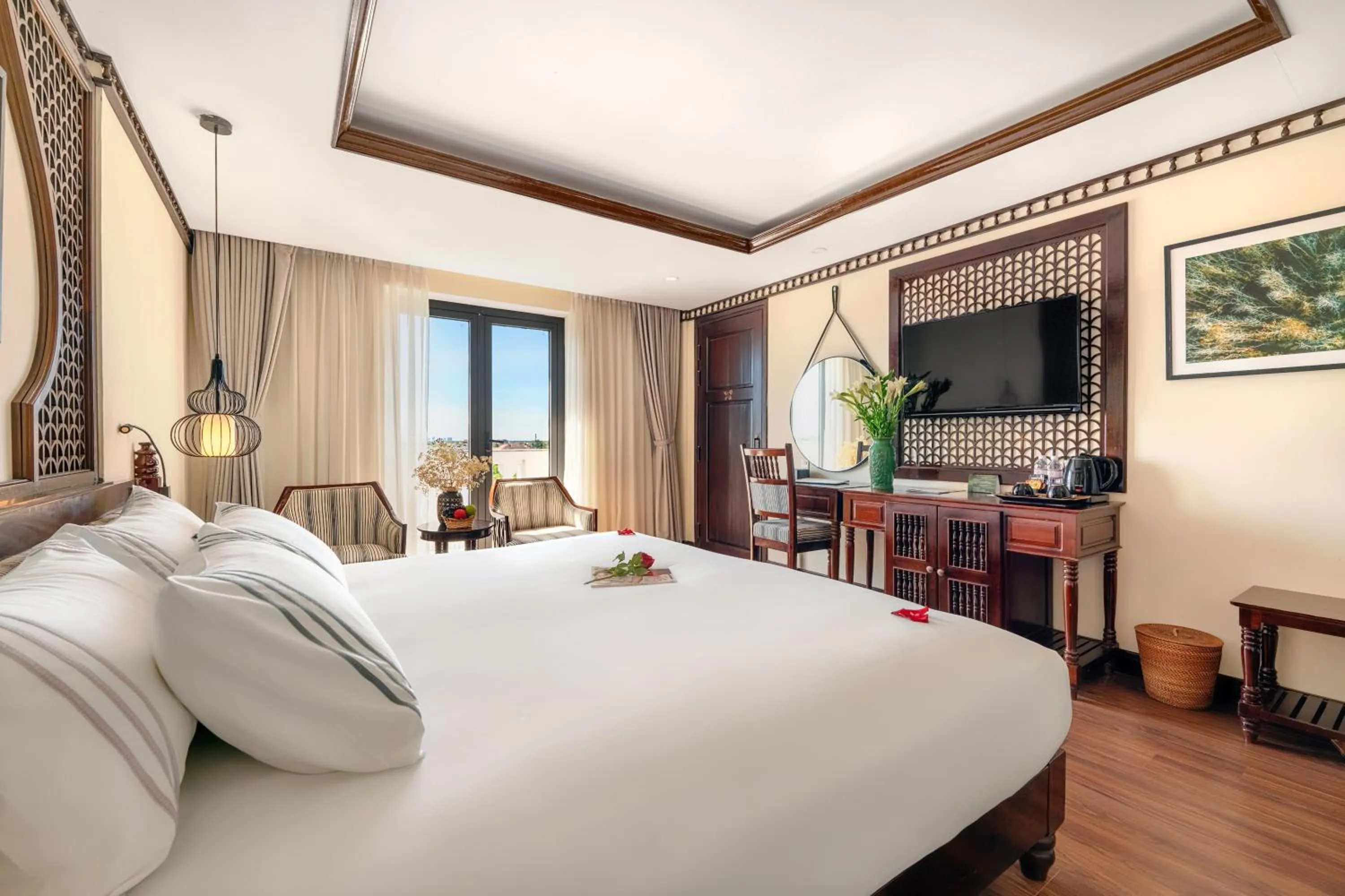 Bed in Qualia De Hôtel Hoi An - Rooftop Bar City View