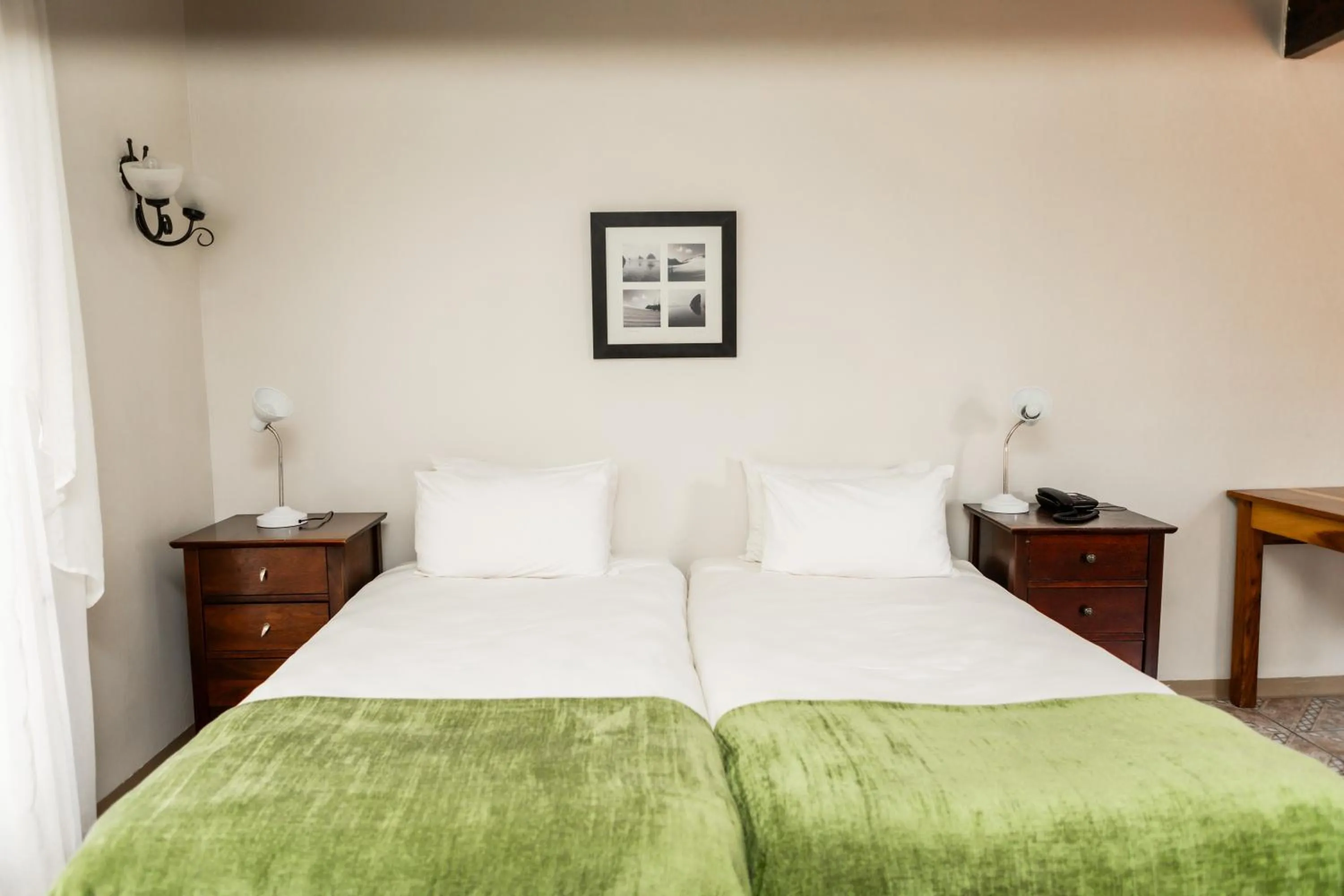 Bed in Casa Blanca Boutique Hotel Pension