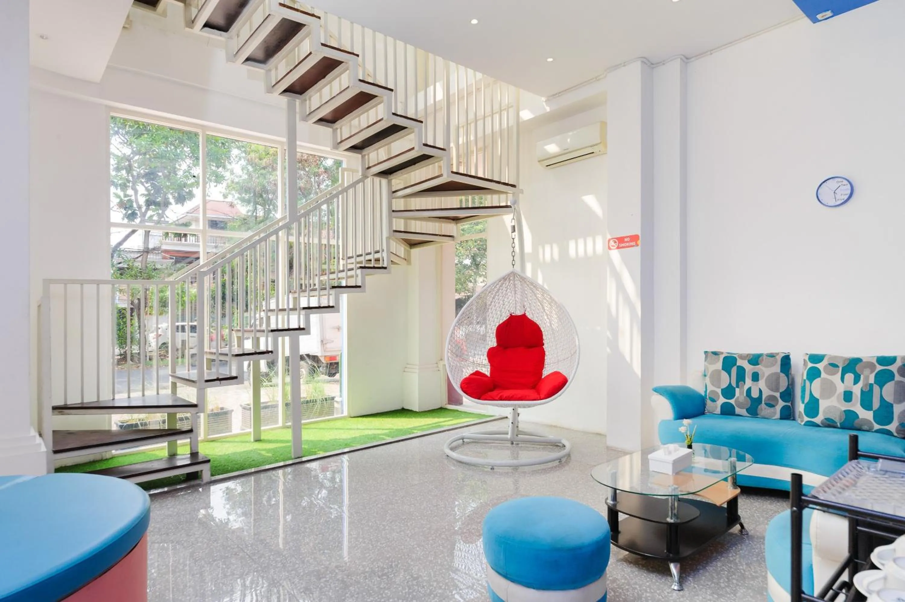 Seating area in Sans Hotel La Vida Malang