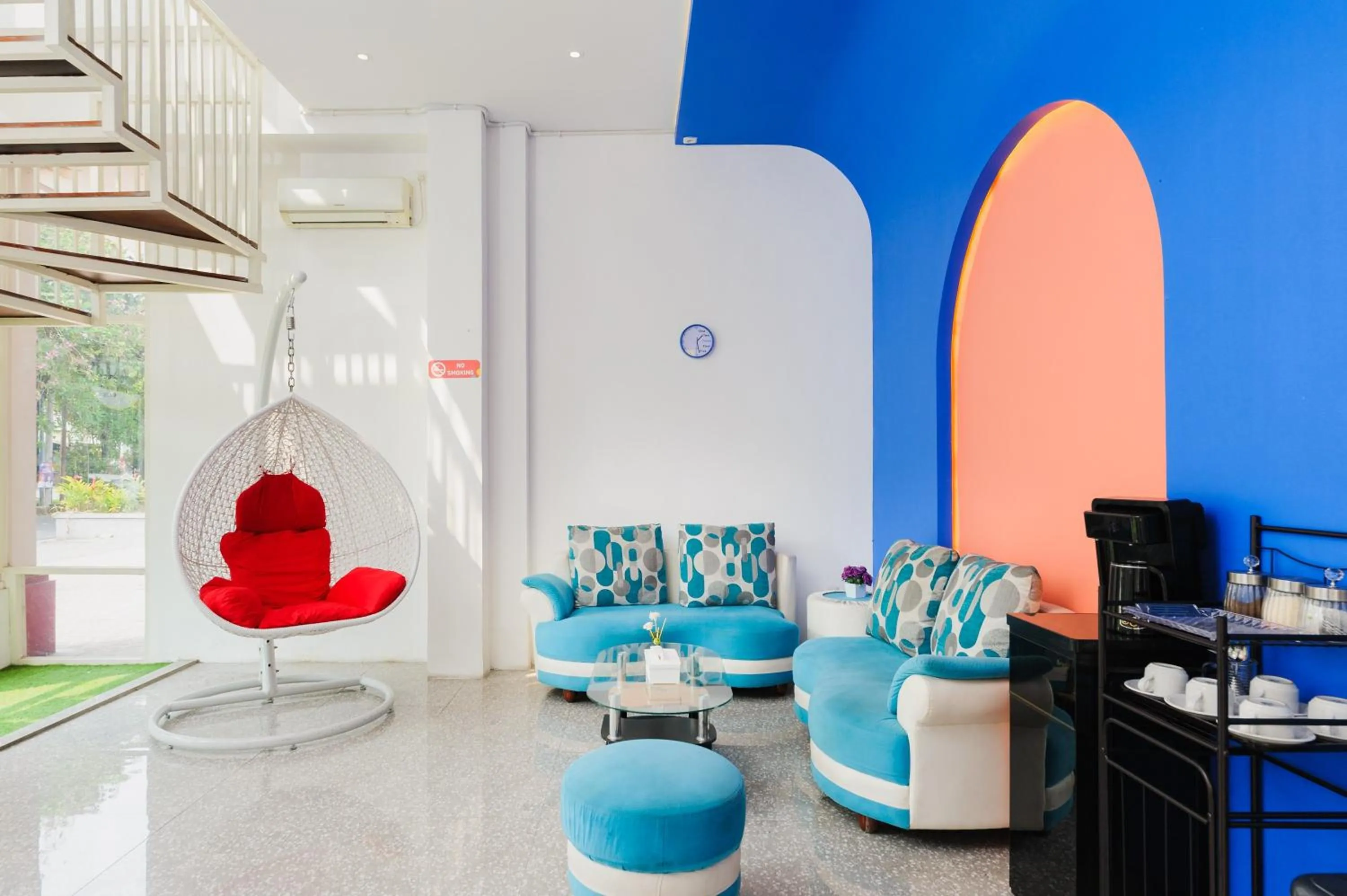 Seating area in Sans Hotel La Vida Malang