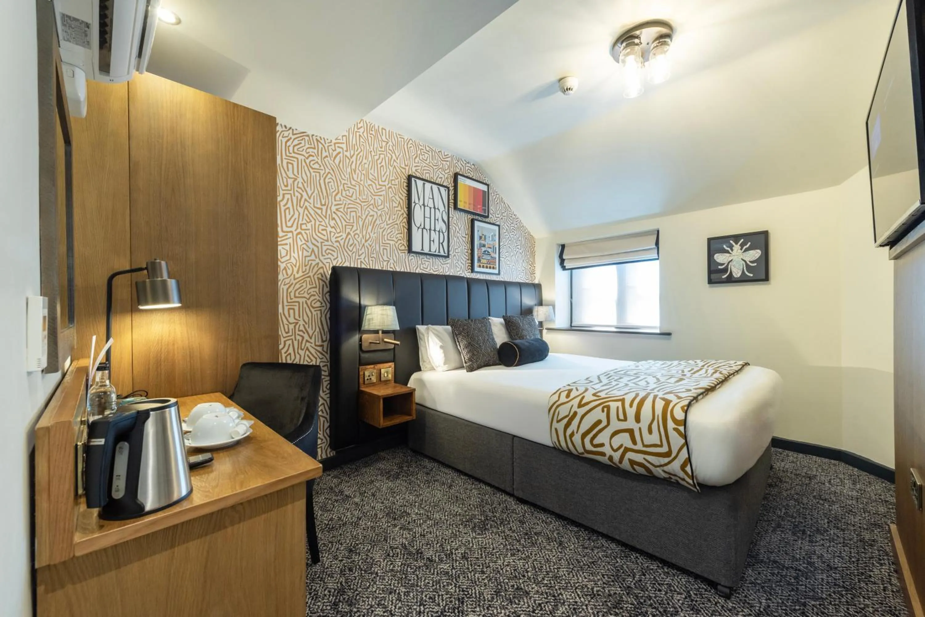 Bed in Abel Heywood Boutique Hotel