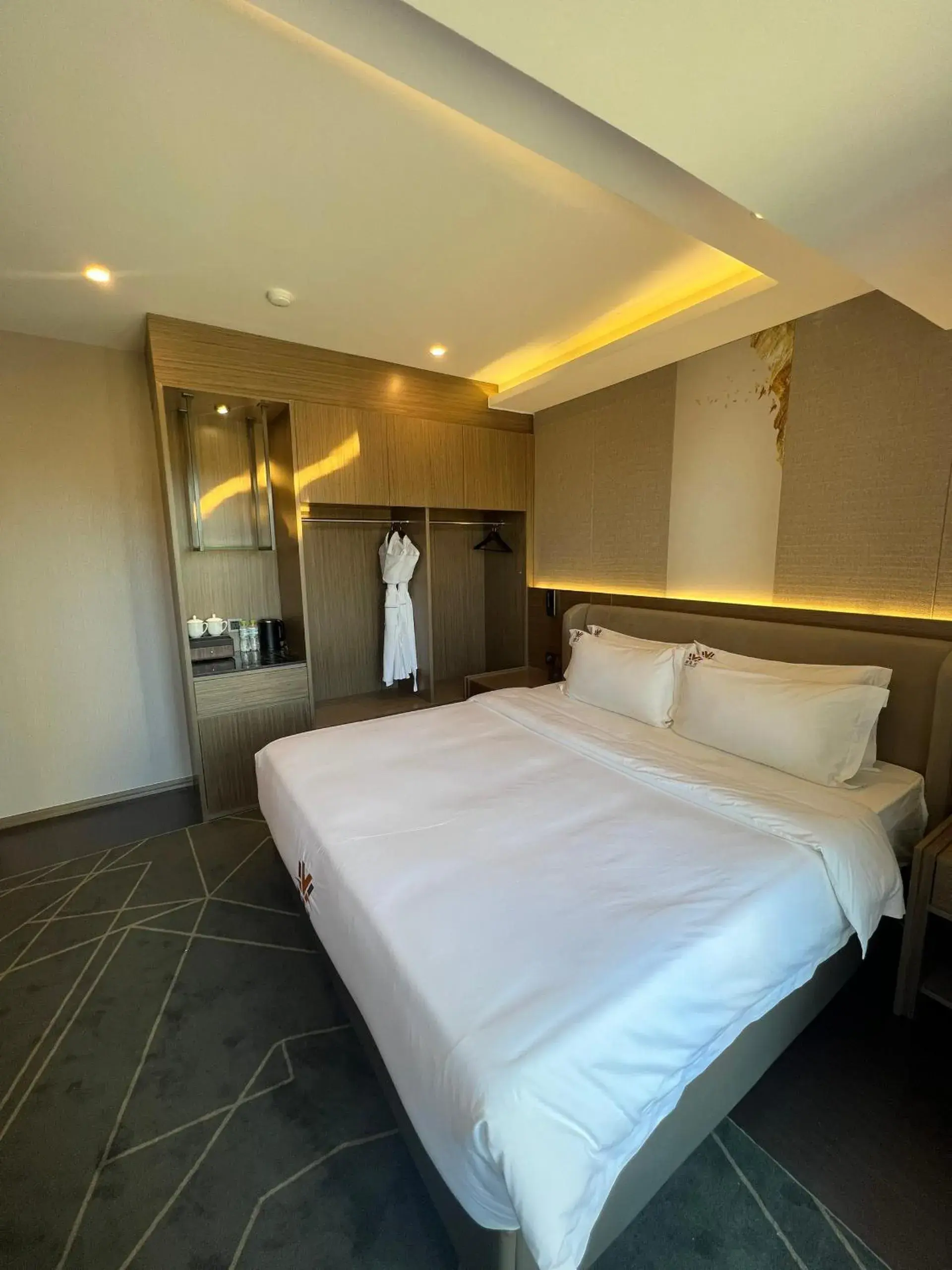 Bed in Wah Fu Hotel Bed in Wah Fu Hotel