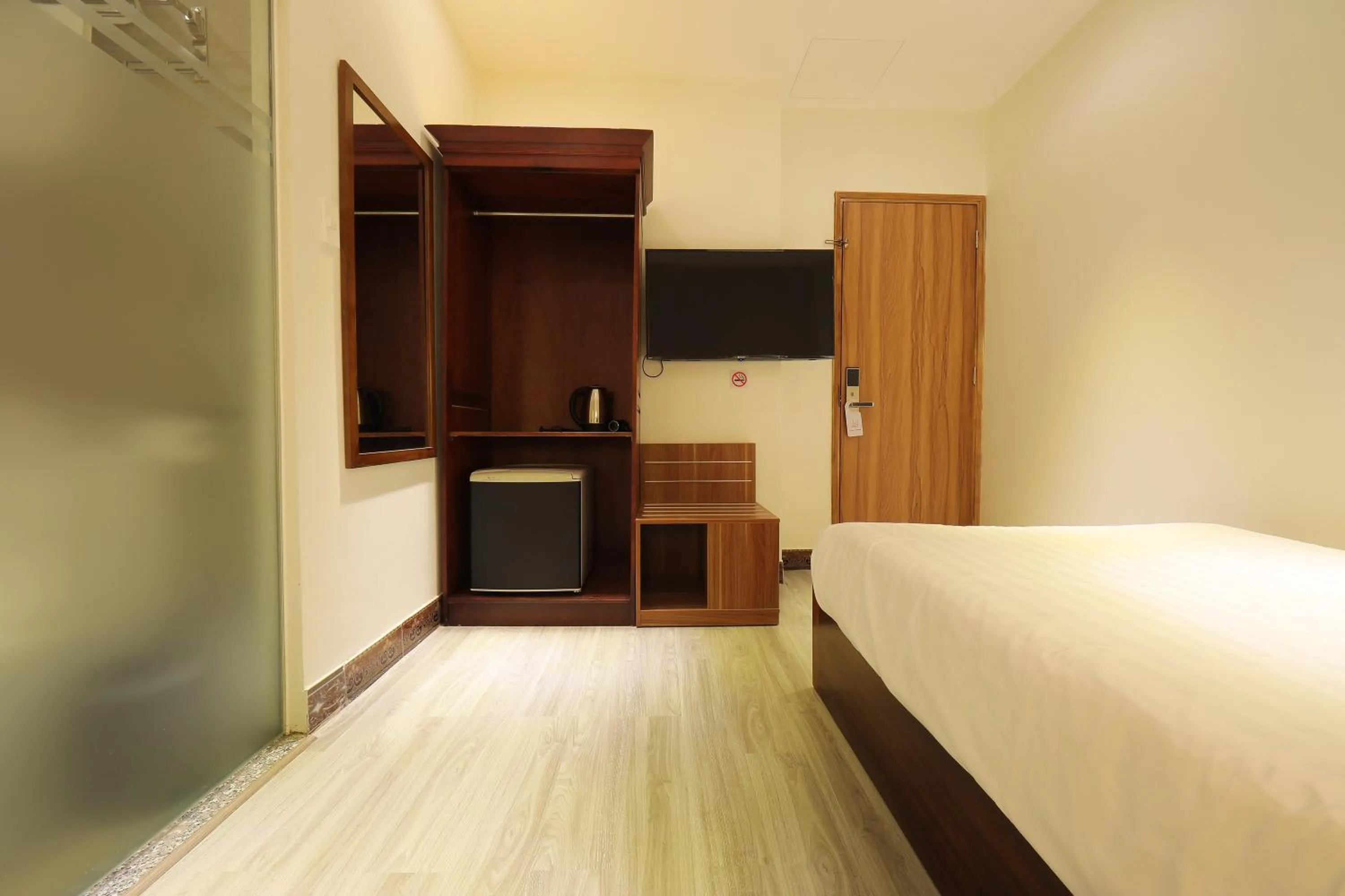 wardrobe, Bed in Lanura Saigon Boutique Hotel
