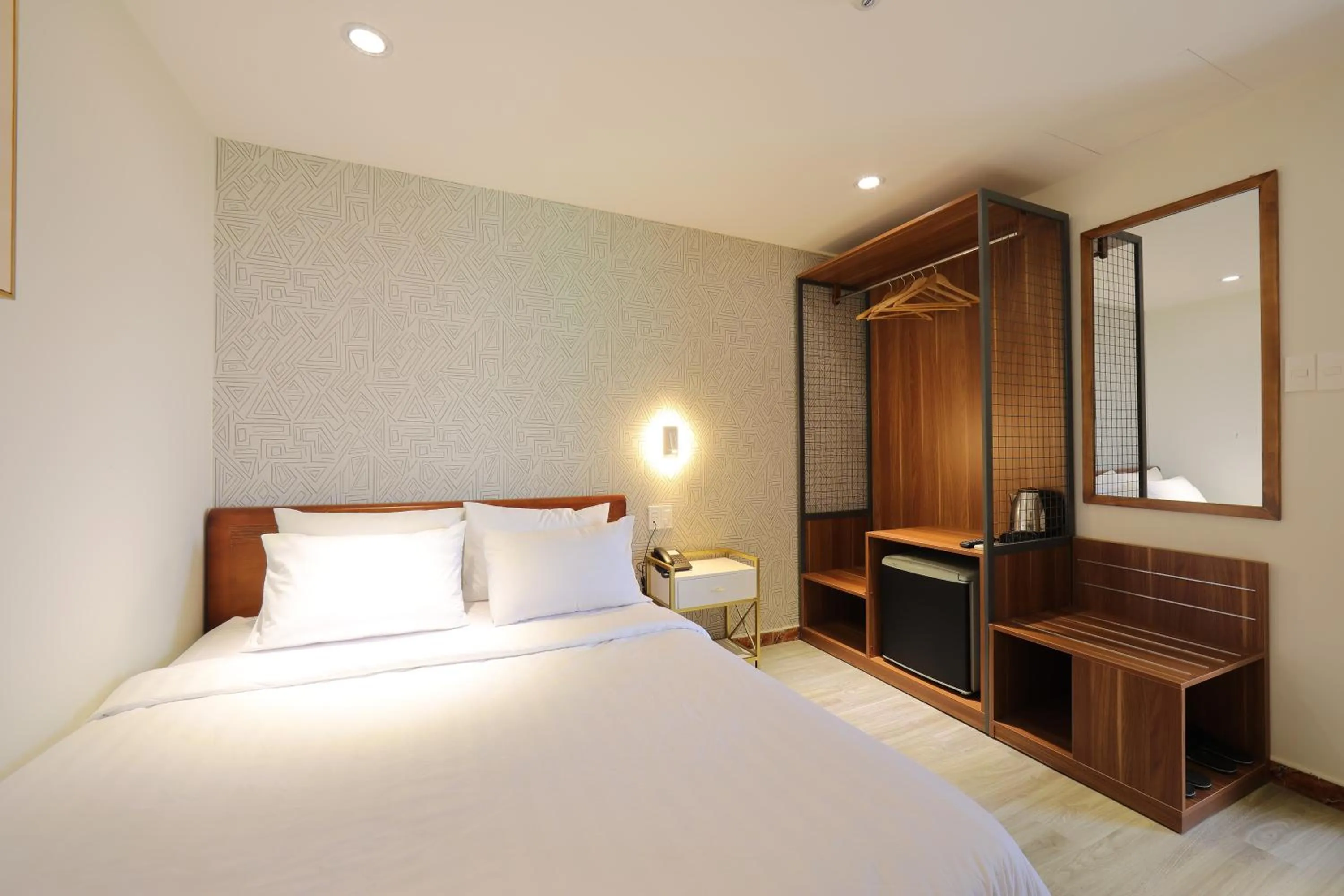 Bed in Lanura Saigon Boutique Hotel