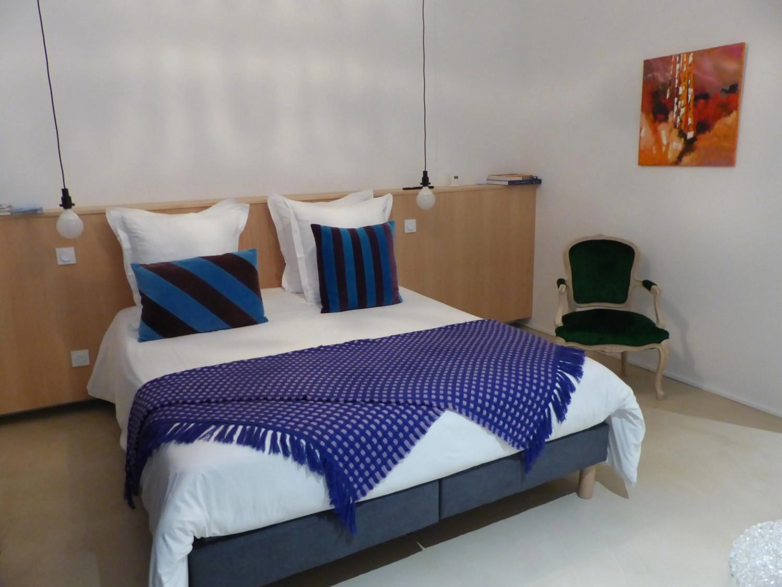 Bed in Les Chambres d'hôtes de Kérasquer