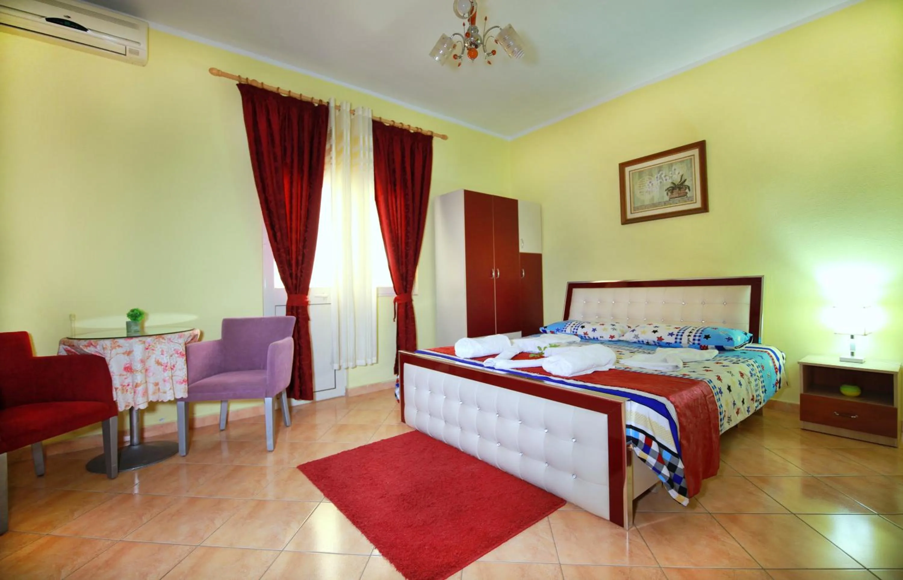 Seating area, Bed in My Home Guest House