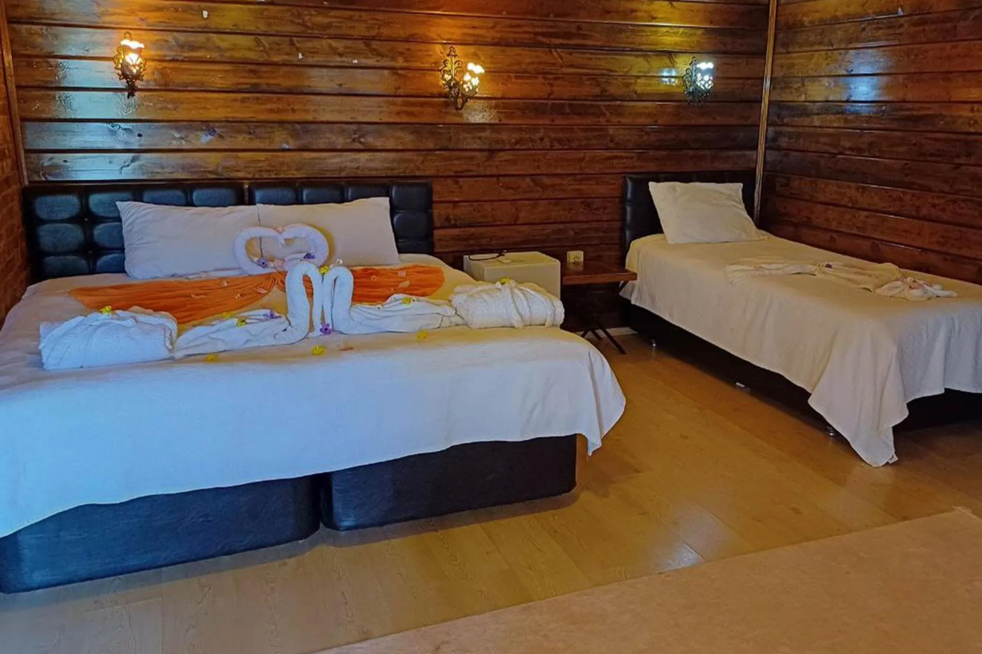 Bed in Angels Garden Hotel