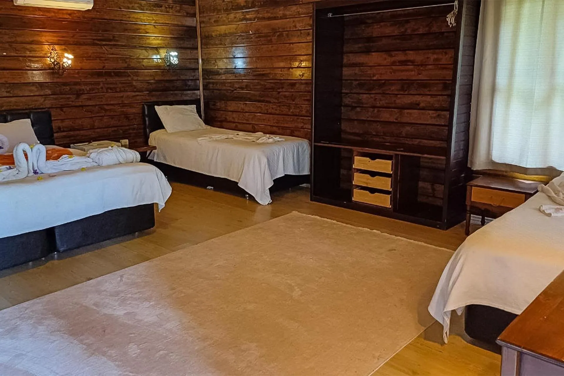 Bed in Angels Garden Hotel