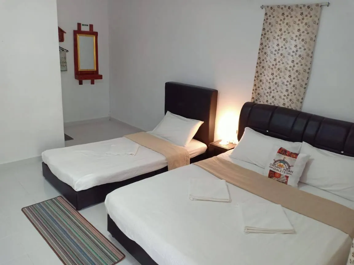 Bed in Chenang Indah Chalets