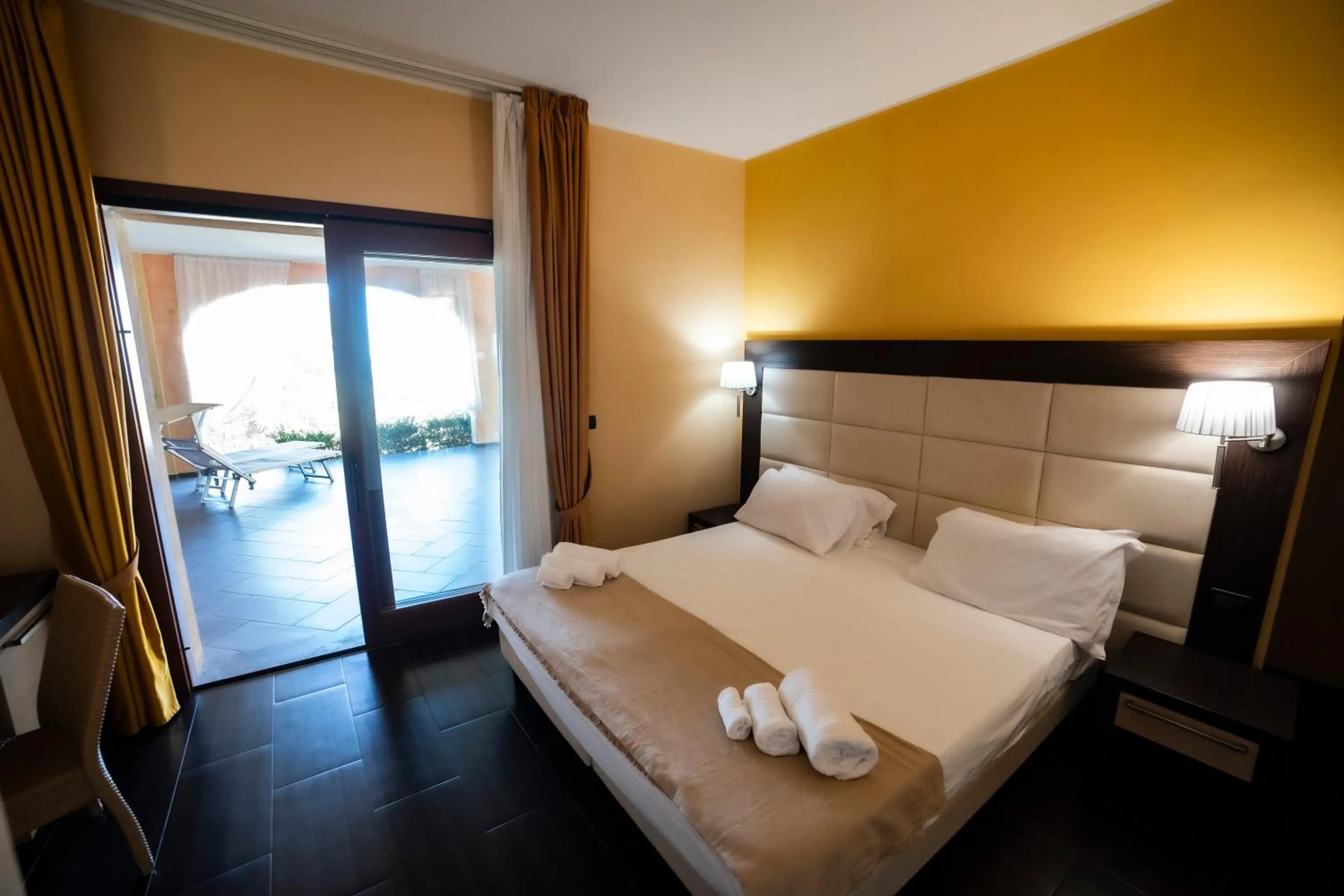 Patio, Bed in UNICO Cannamele Escape Tropea by Life Resorts