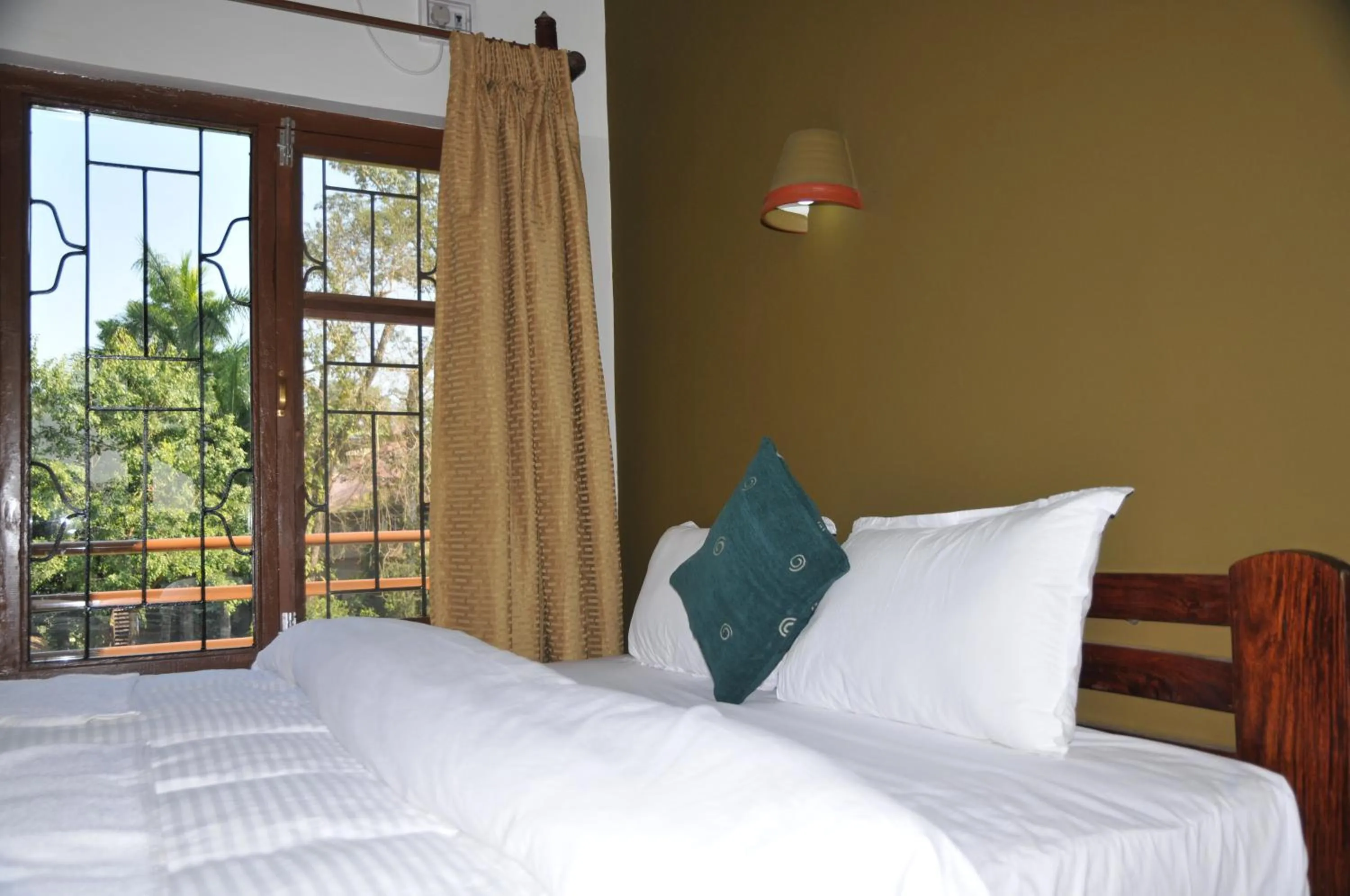 Bed in River View Jungle Camp