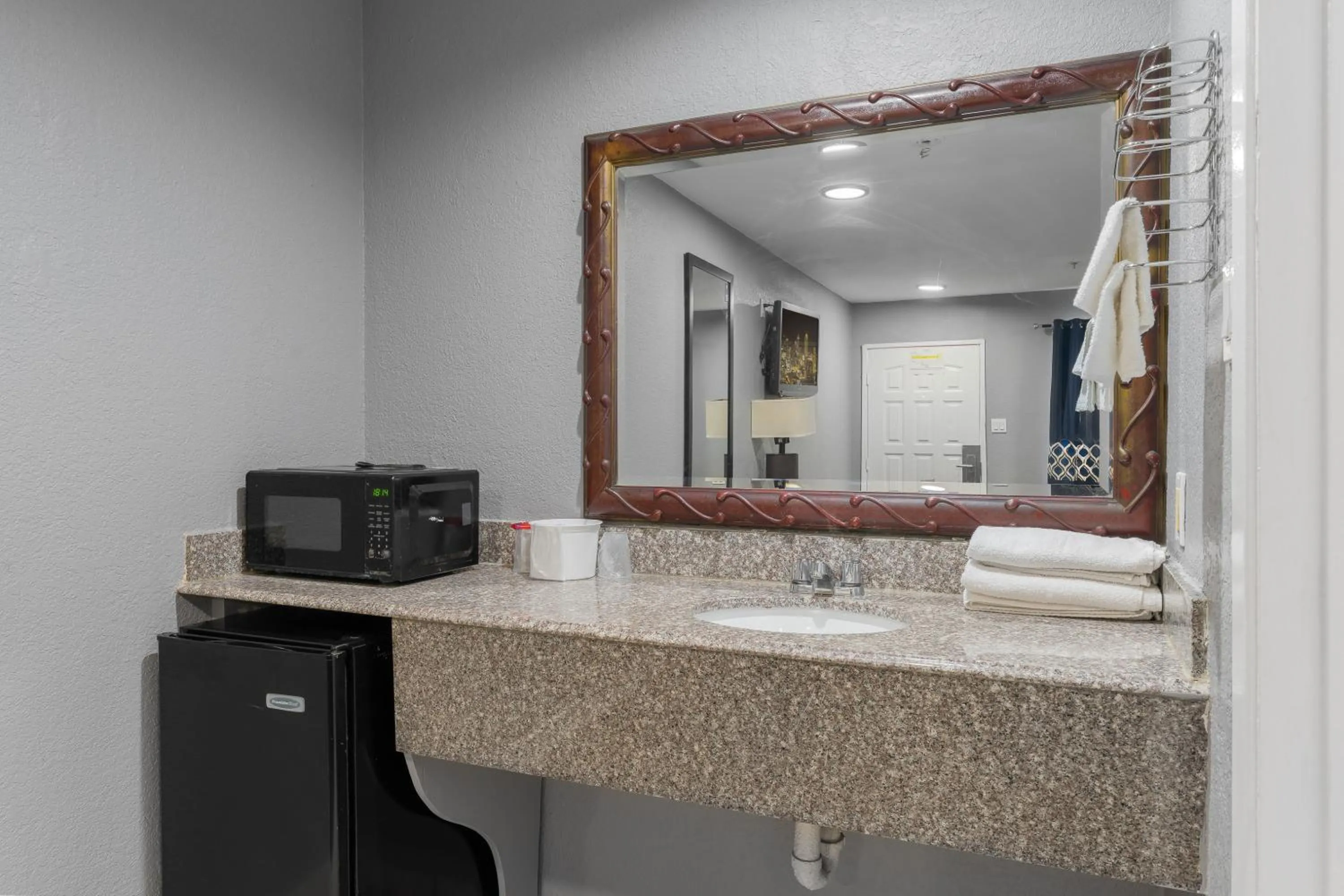 Bathroom in Golden Inn Dallas by Hotel O