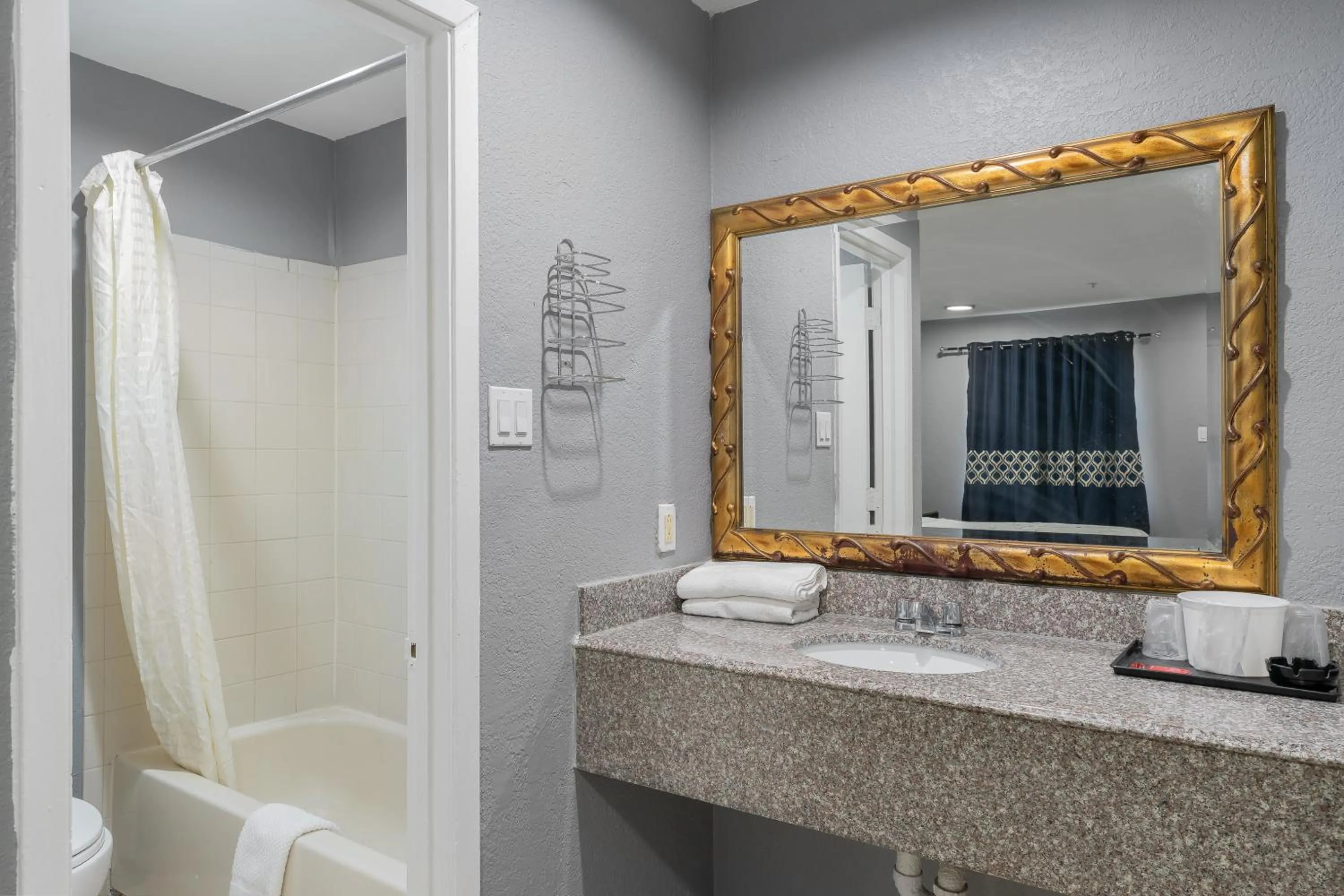Bathroom in Golden Inn Dallas by Hotel O