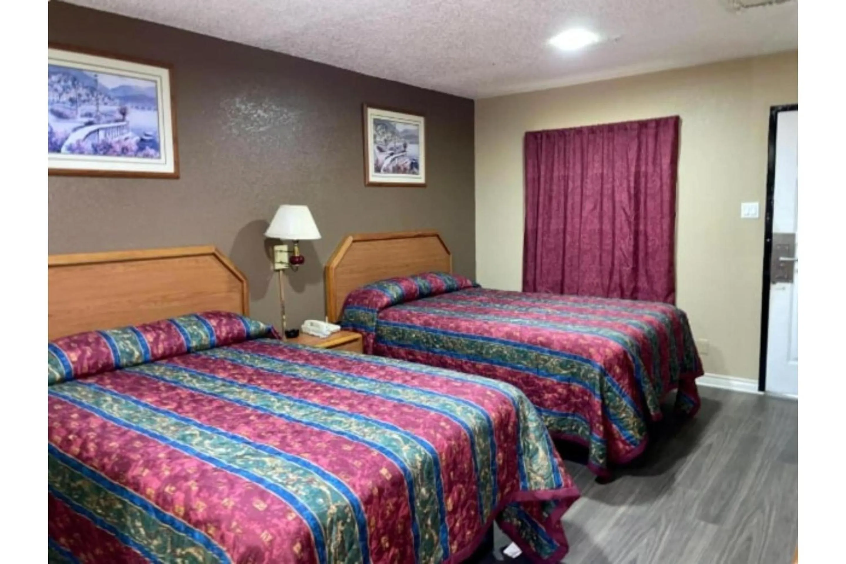 Bedroom, Bed in Golden Inn Dallas by Hotel O