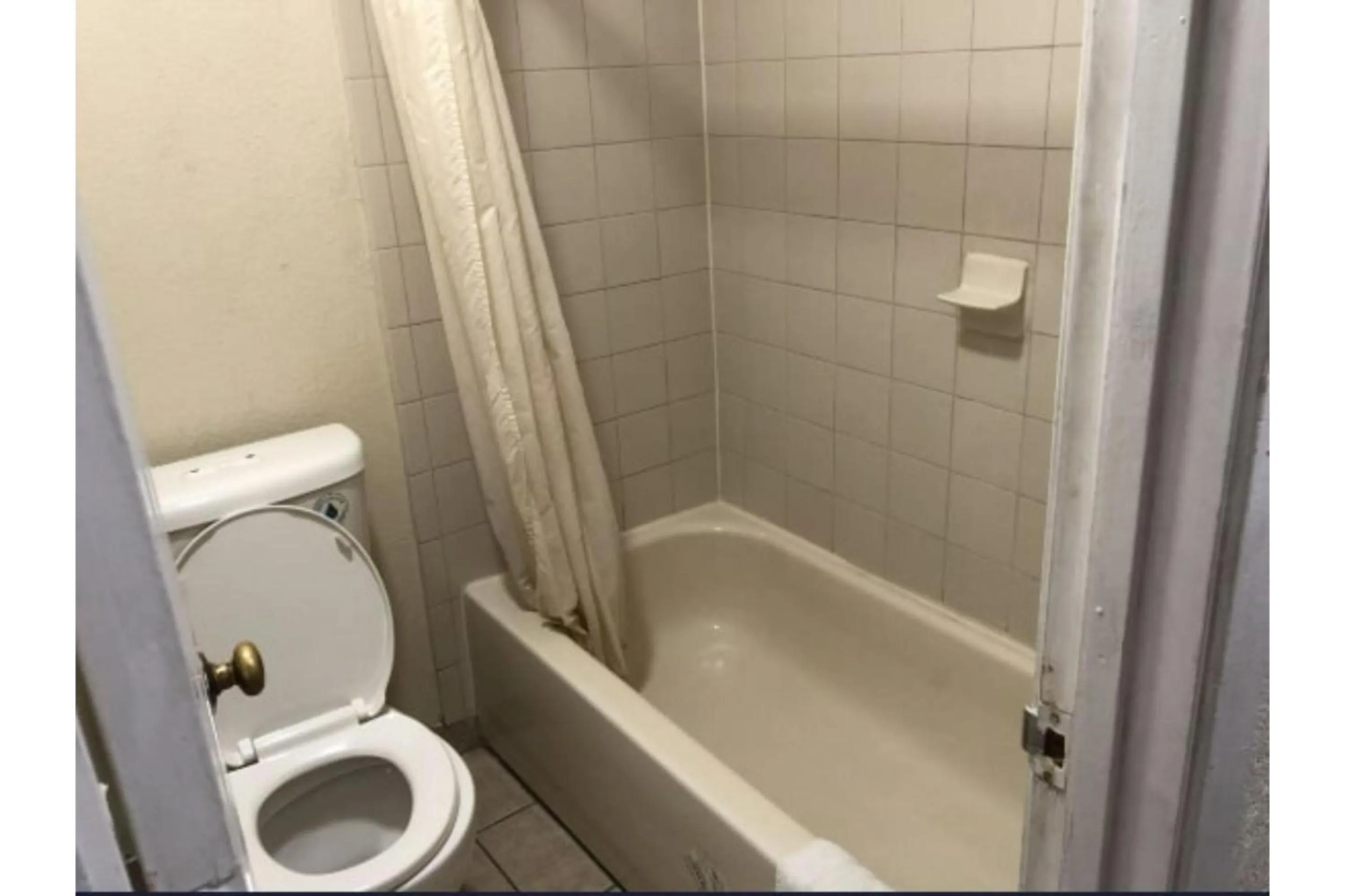 Bathroom in Golden Inn Dallas by Hotel O