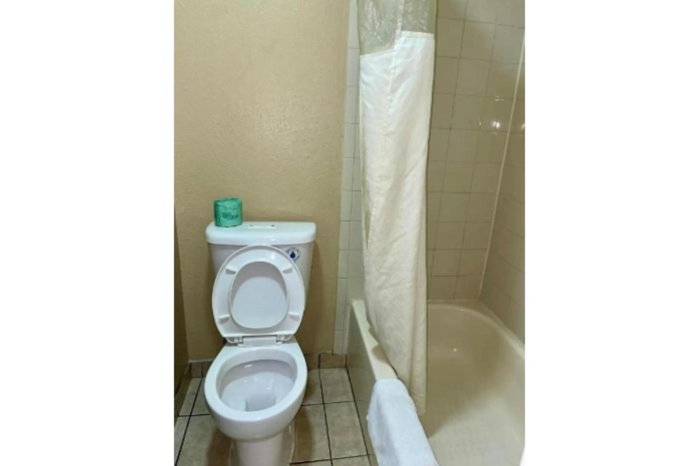 Bathroom in Golden Inn Dallas by Hotel O