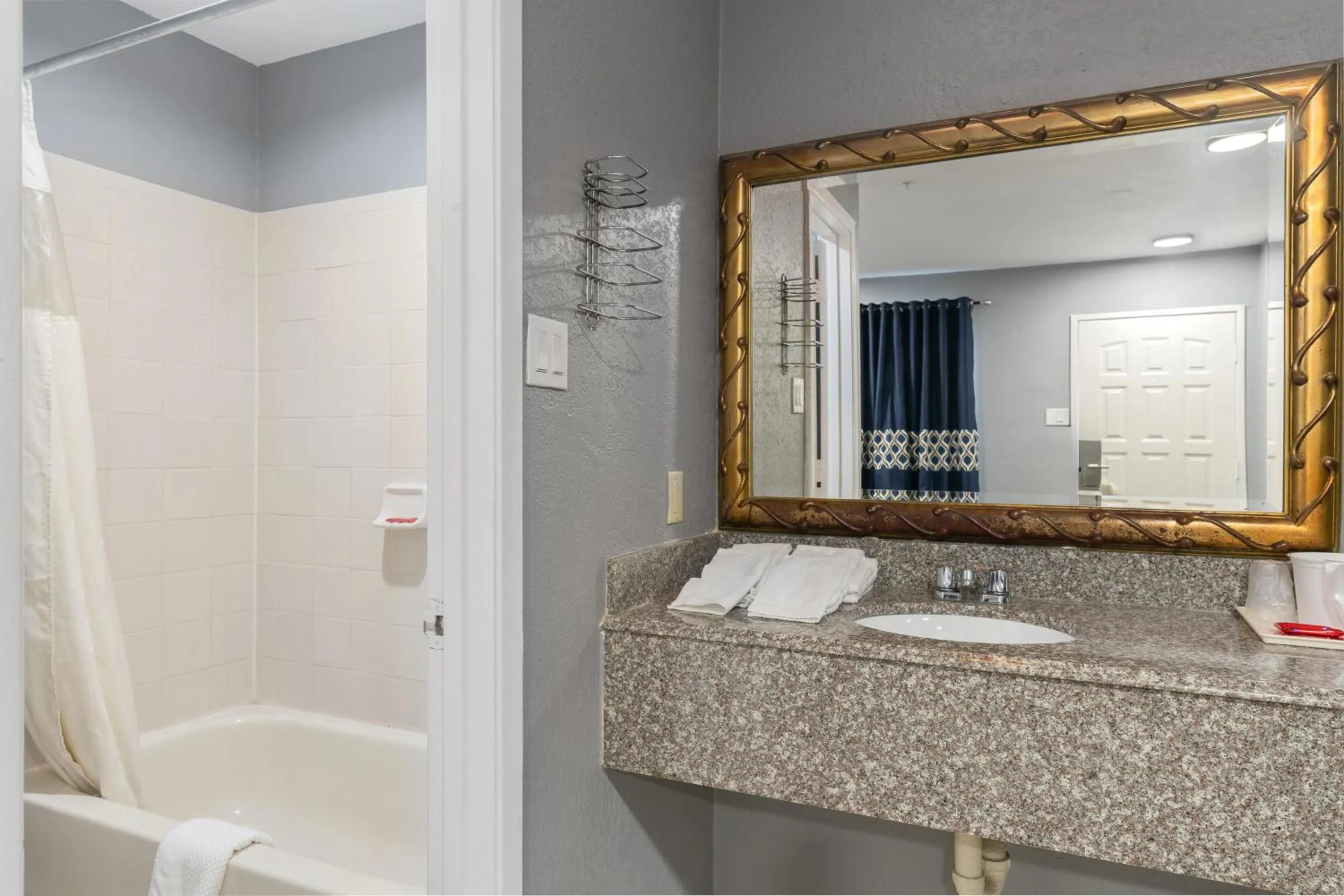 Bathroom in Golden Inn Dallas by Hotel O