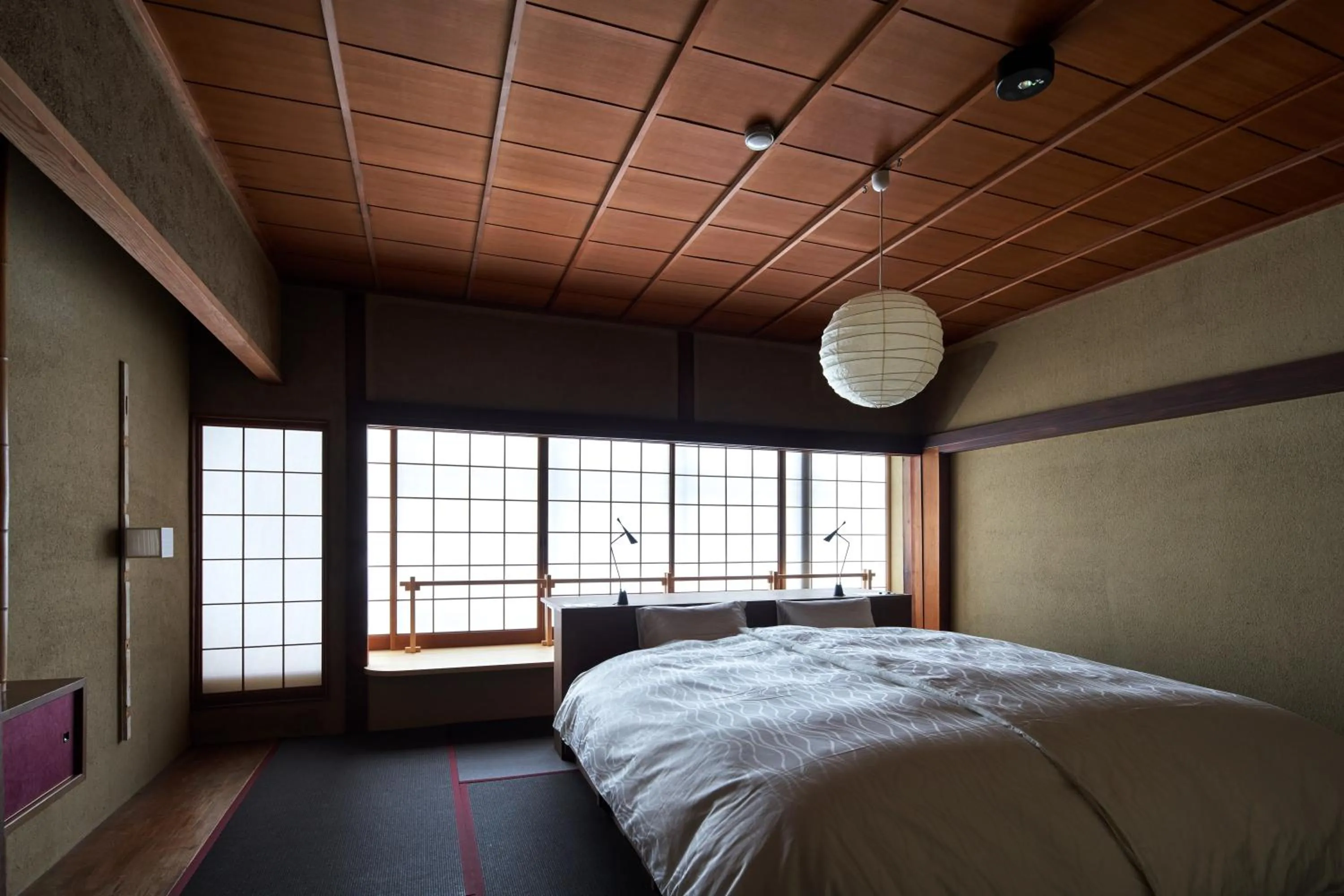 Bed in 城崎温泉 旅館 つばき乃 - Kinosaki Onsen Ryokan Tsubakino