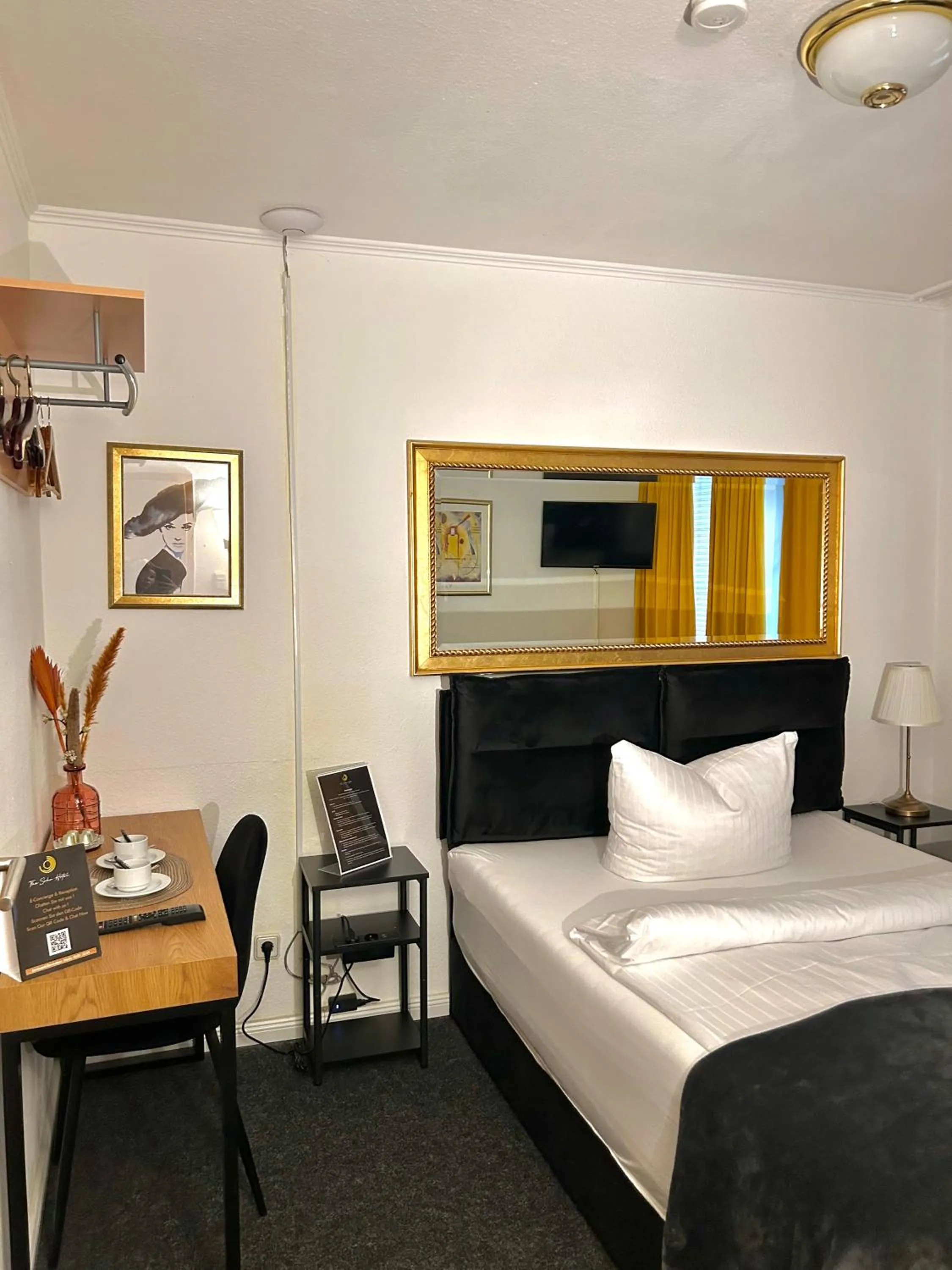 Seating area, Bed in The Soho Altstadt Relais