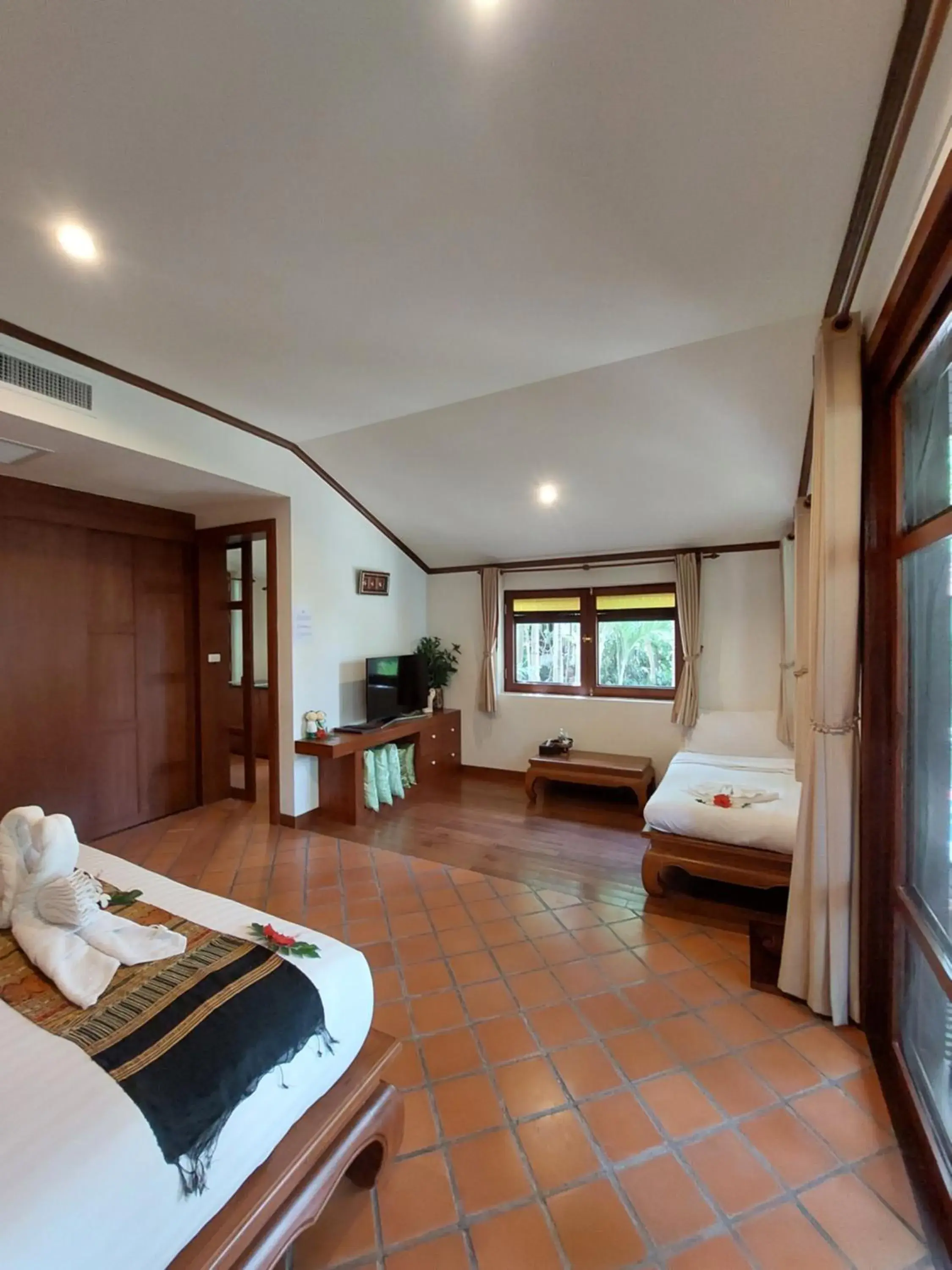 Bed in Baan Thai Lanta Resort