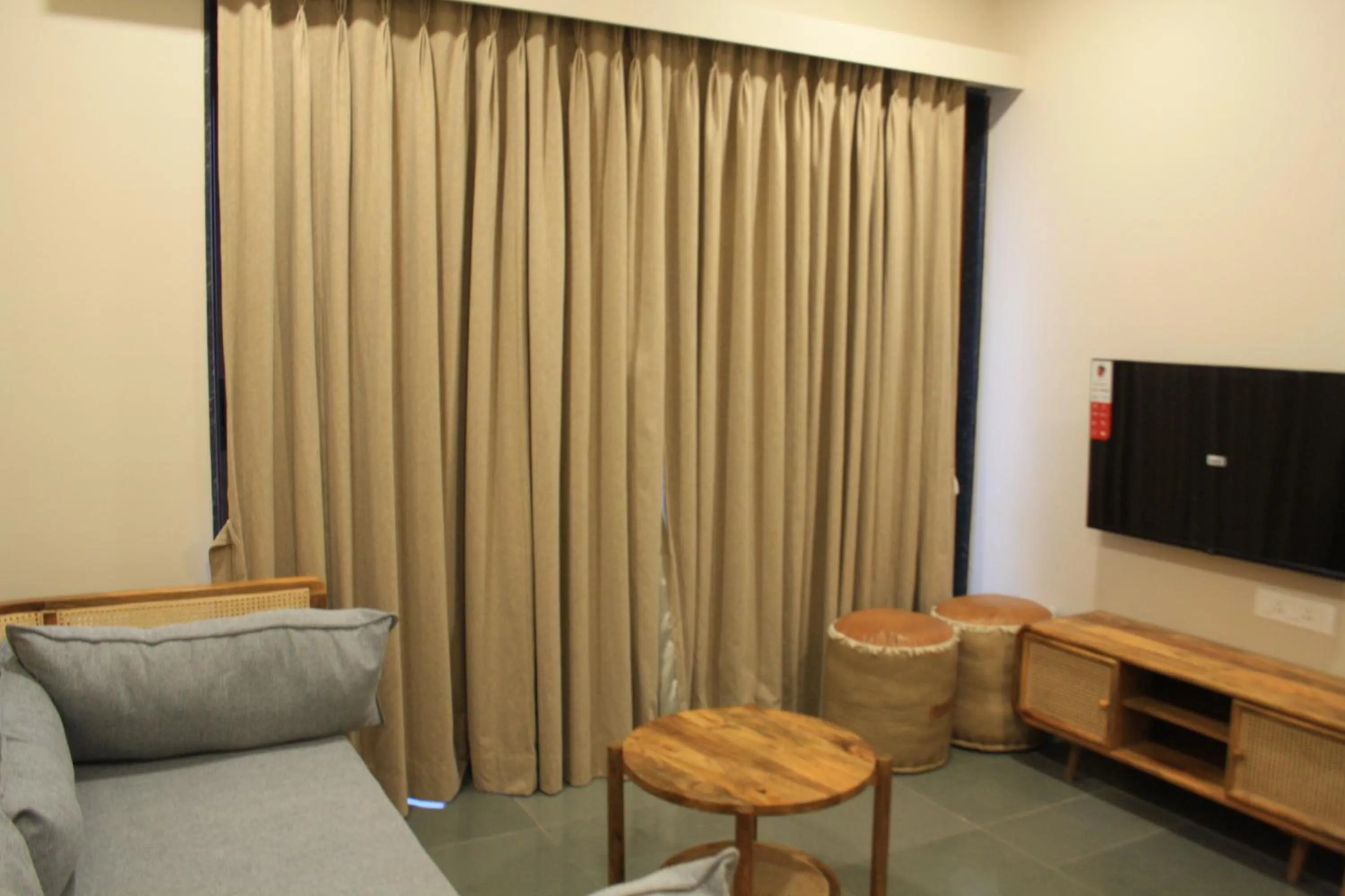 Communal lounge/ TV room, Seating Area in Hotel Tattva Suites