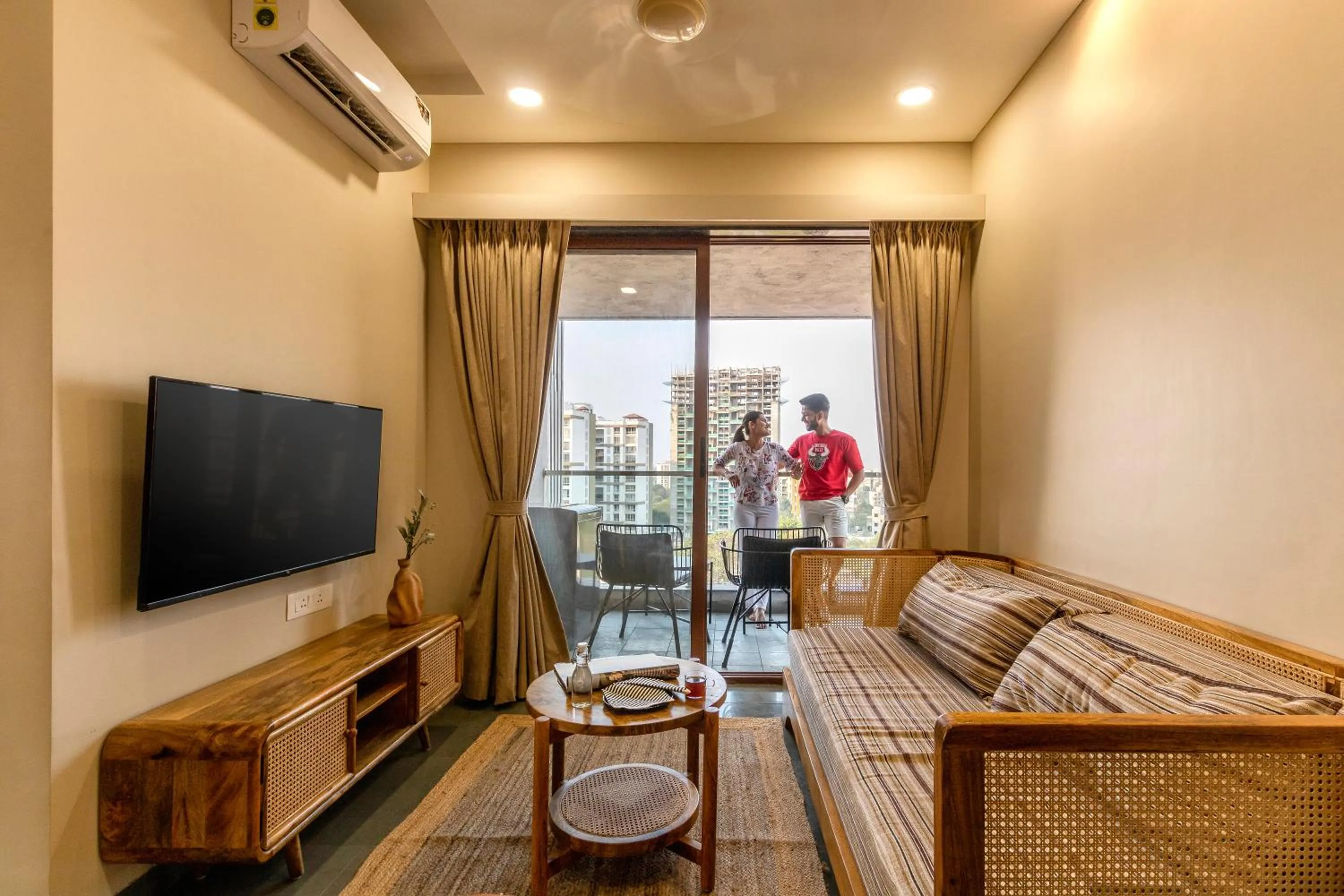 Bed, Seating Area in Hotel Tattva Suites