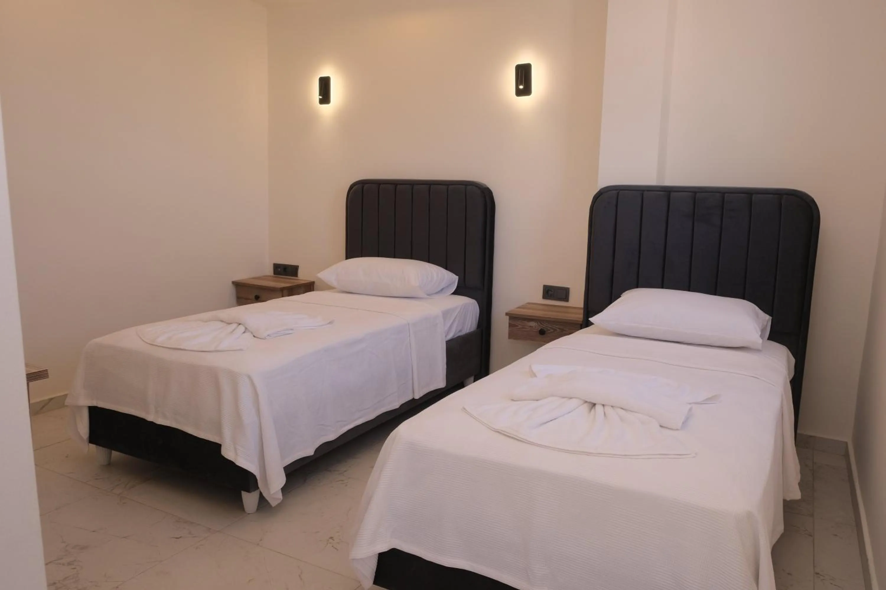 Bed in Sea Door Hotel