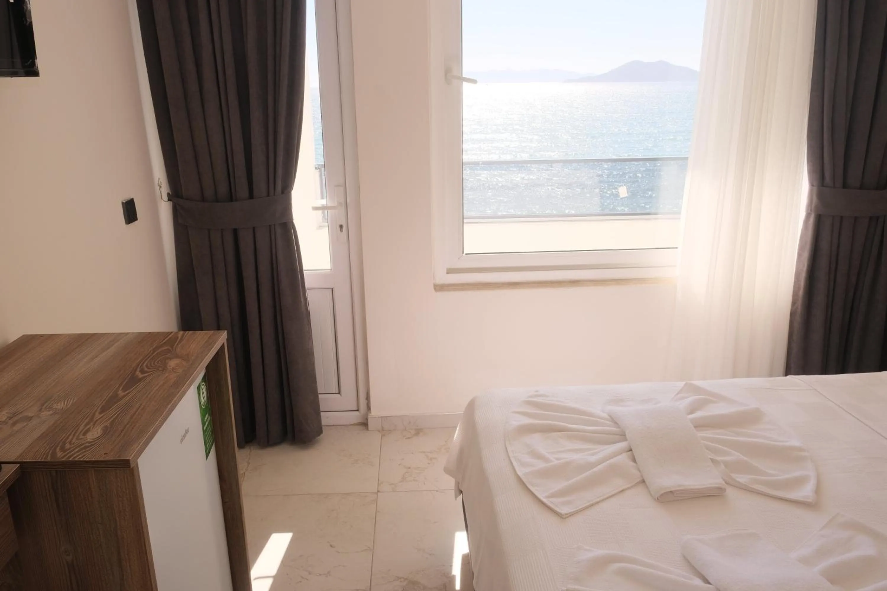 Bed in Sea Door Hotel