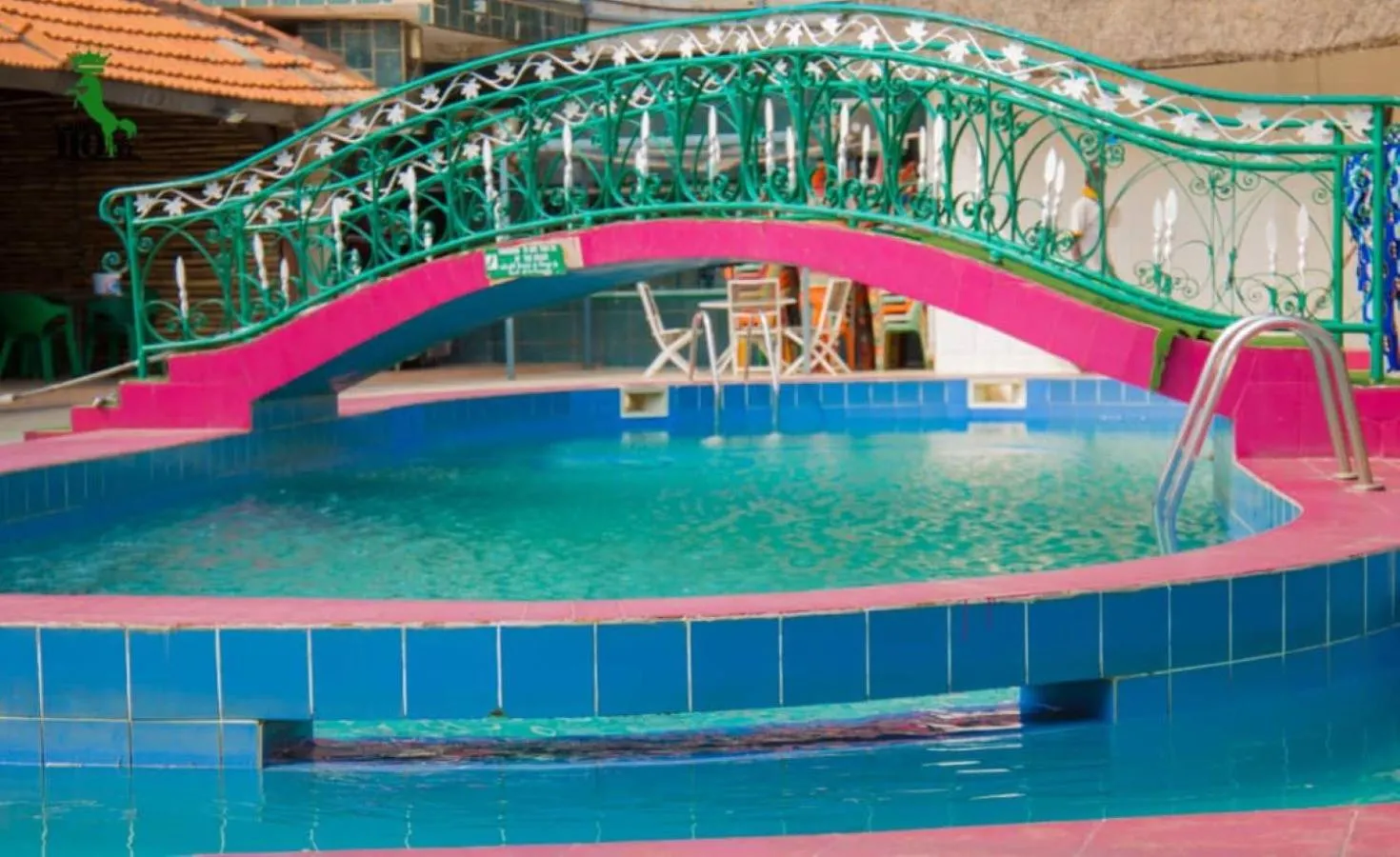 Swimming pool in New Green Horse Hotel