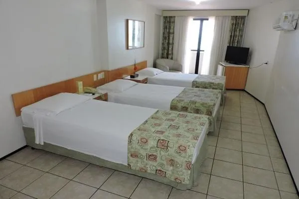 Bed in Iracema Travel