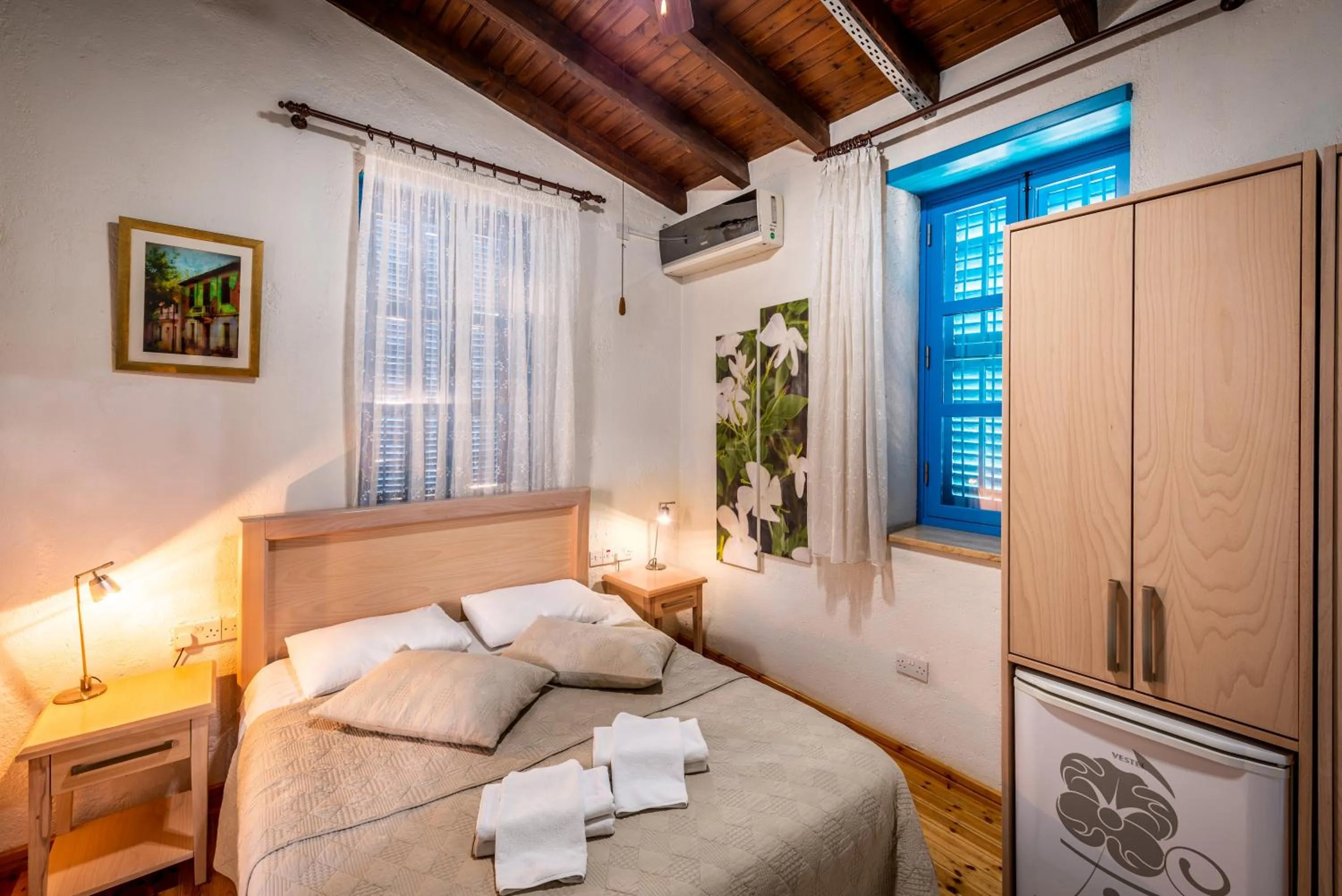 Bed in Cypriot Swallow Boutique Hotel