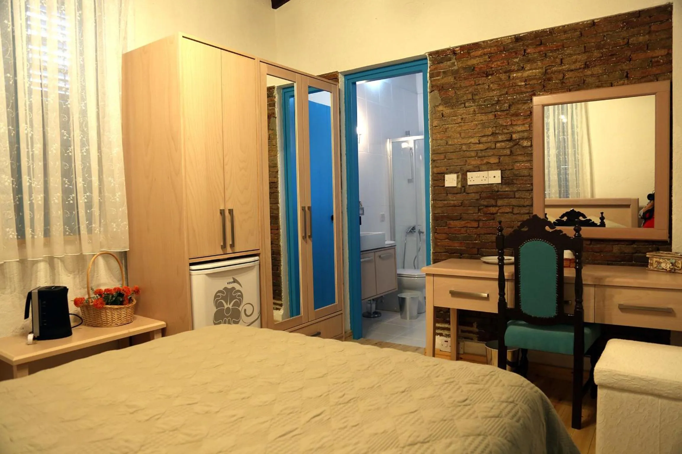 Decorative detail, Bed in Cypriot Swallow Boutique Hotel