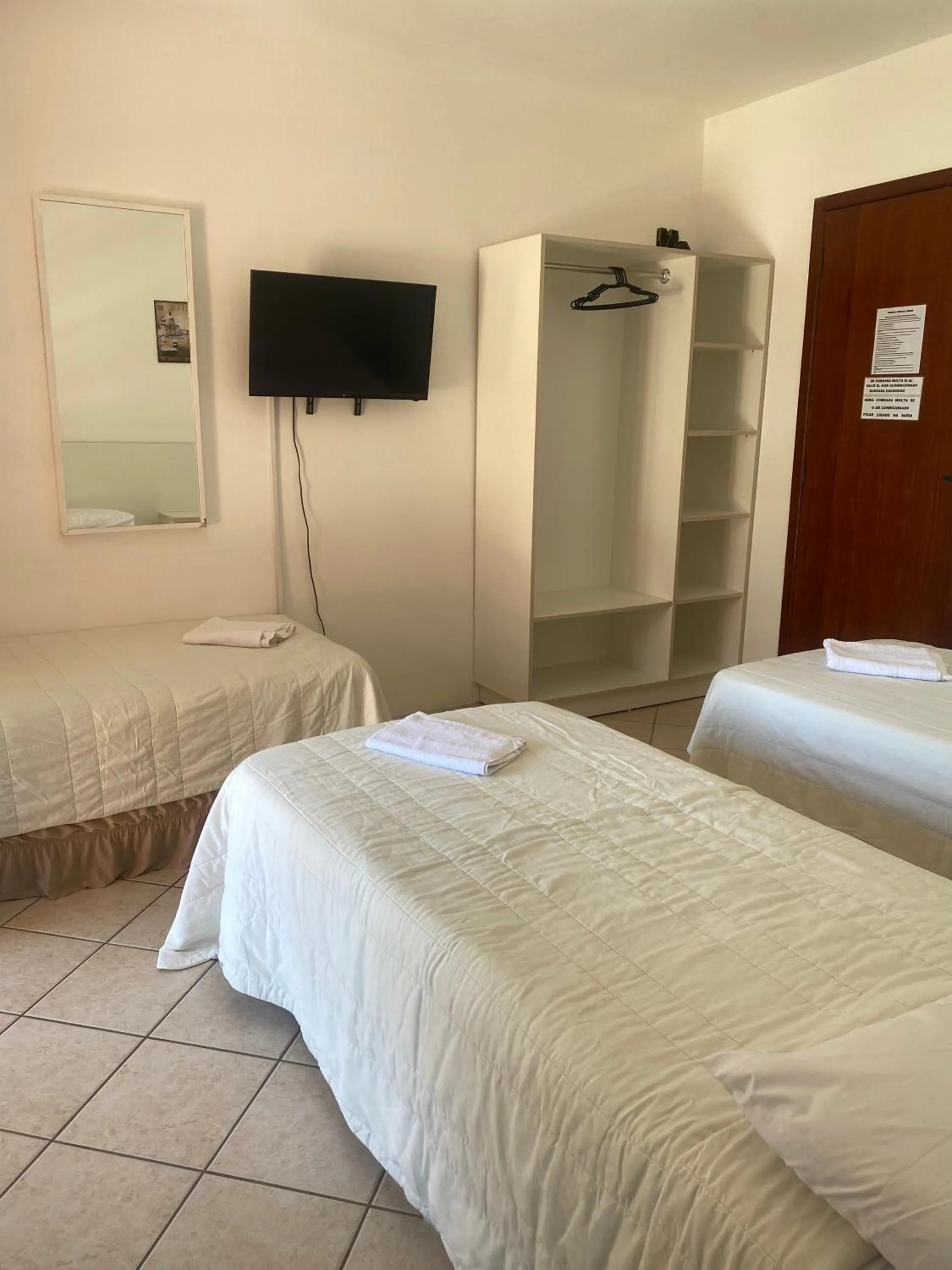 Bed in Pousada Ana Julia