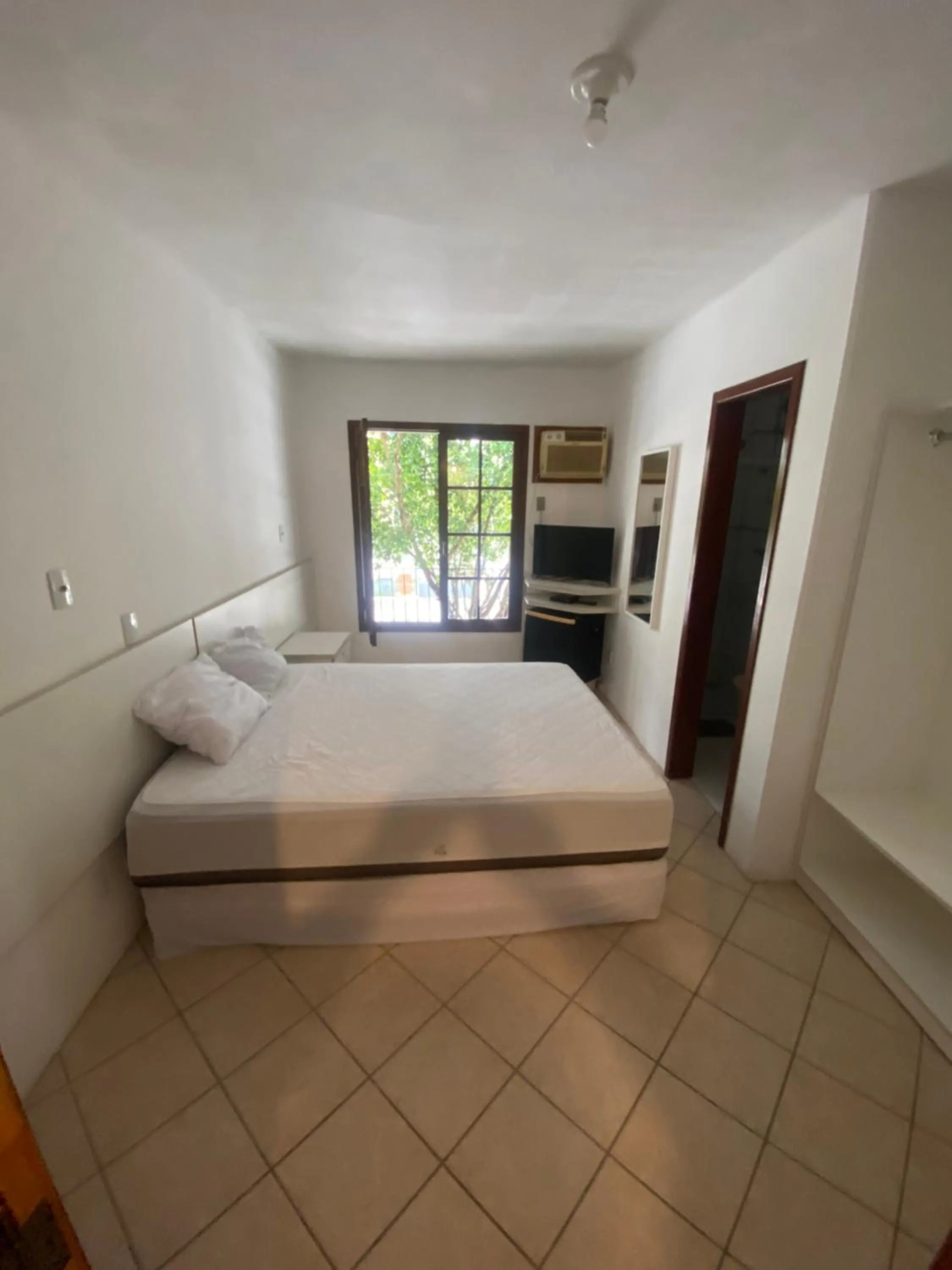 Bed in Pousada Ana Julia