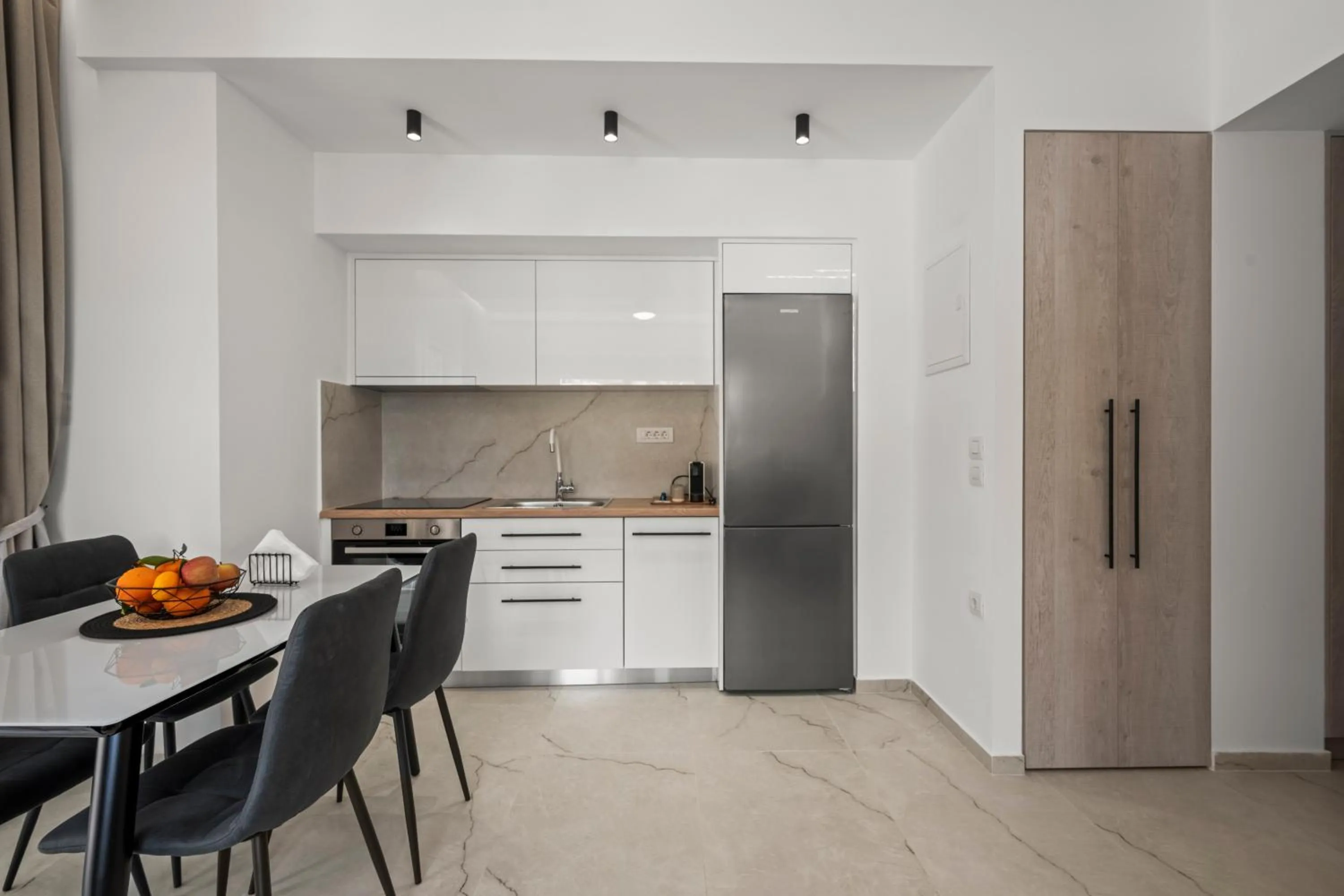 Kitchen or kitchenette in Dora Apartments