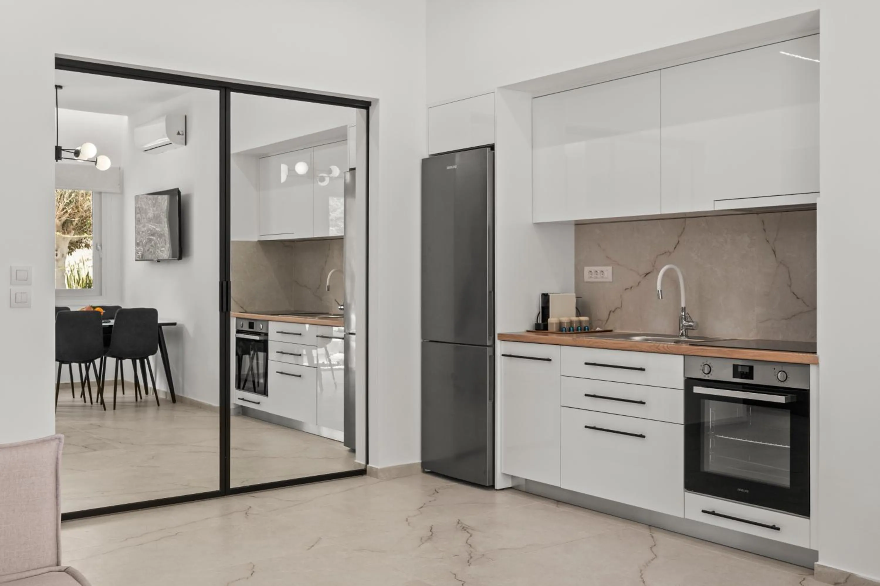 Kitchen or kitchenette in Dora Apartments