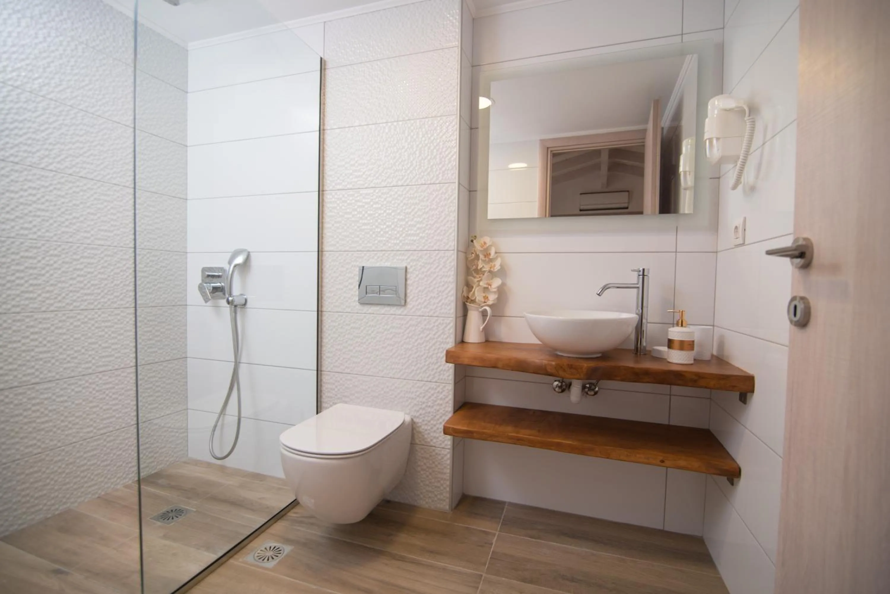Shower in Dora Apartments