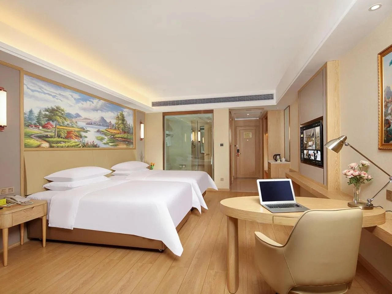 Bed in Vienna International Hotel Wenchang