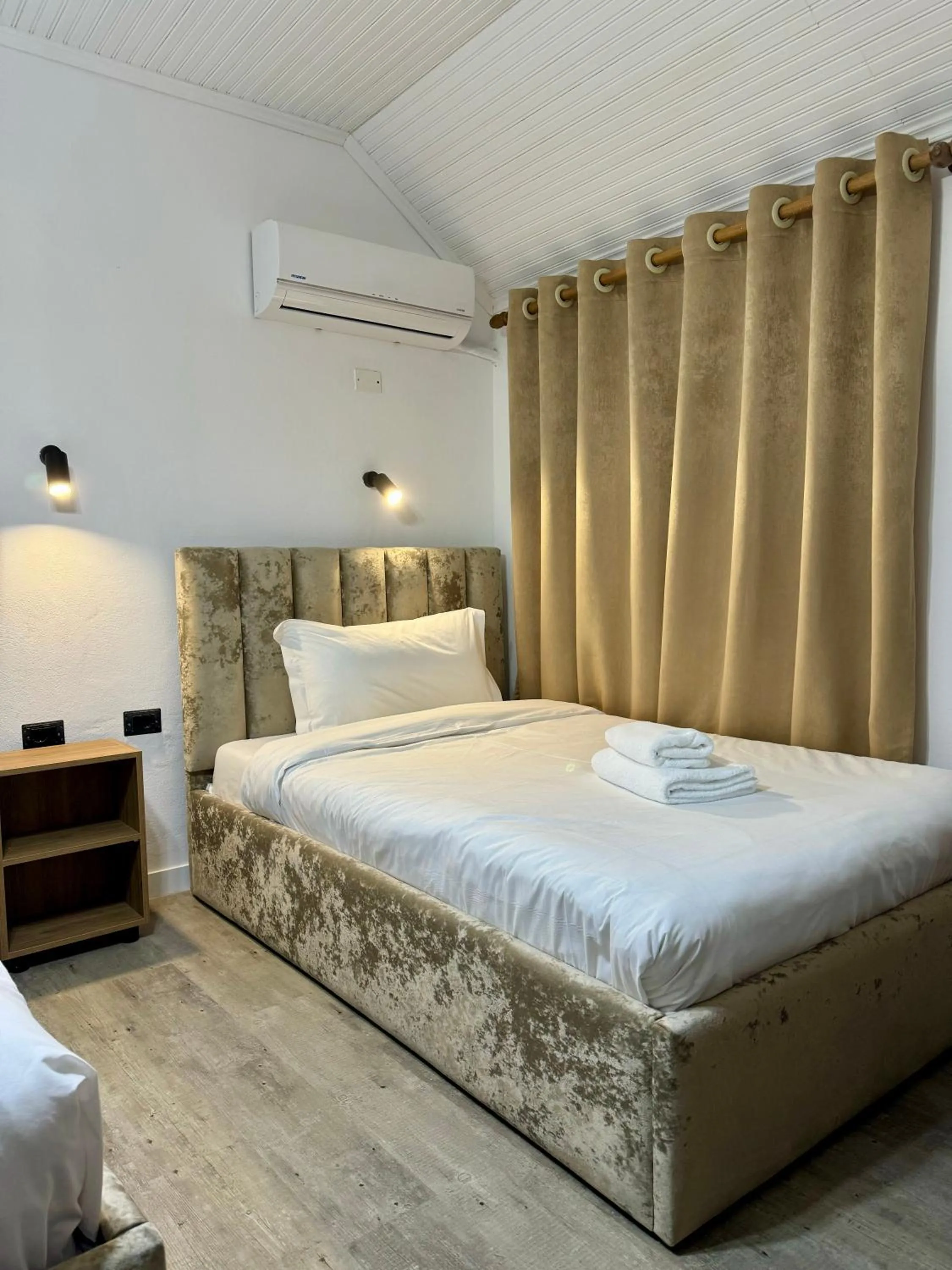 Bed in VILA ALIZEE Hotel
