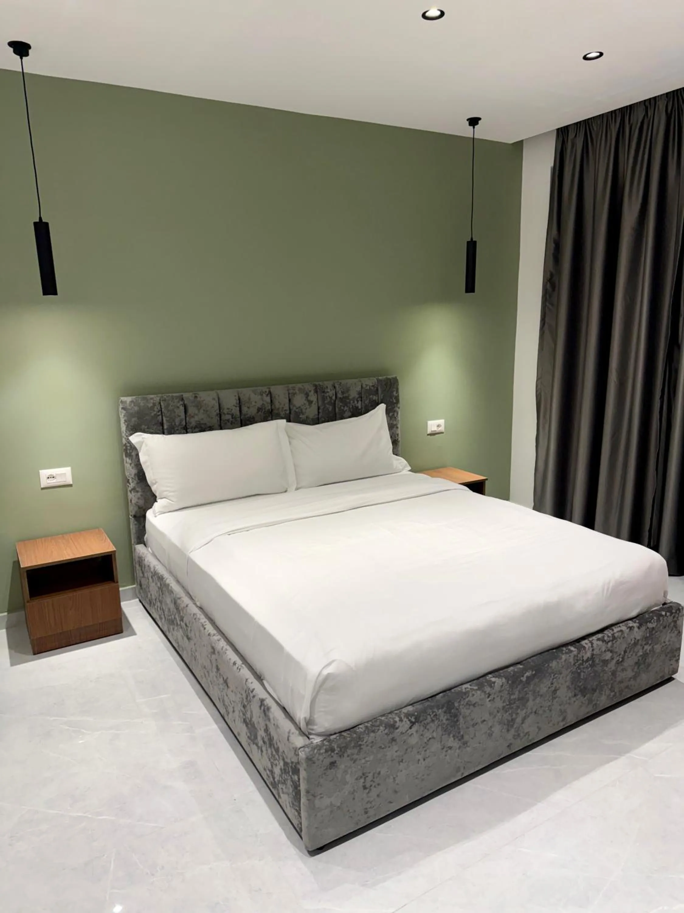 Bed in VILA ALIZEE Hotel