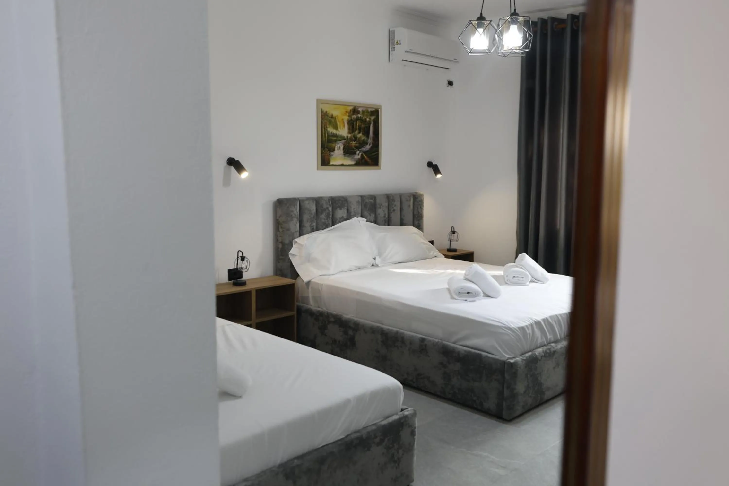 Bed in VILA ALIZEE Hotel