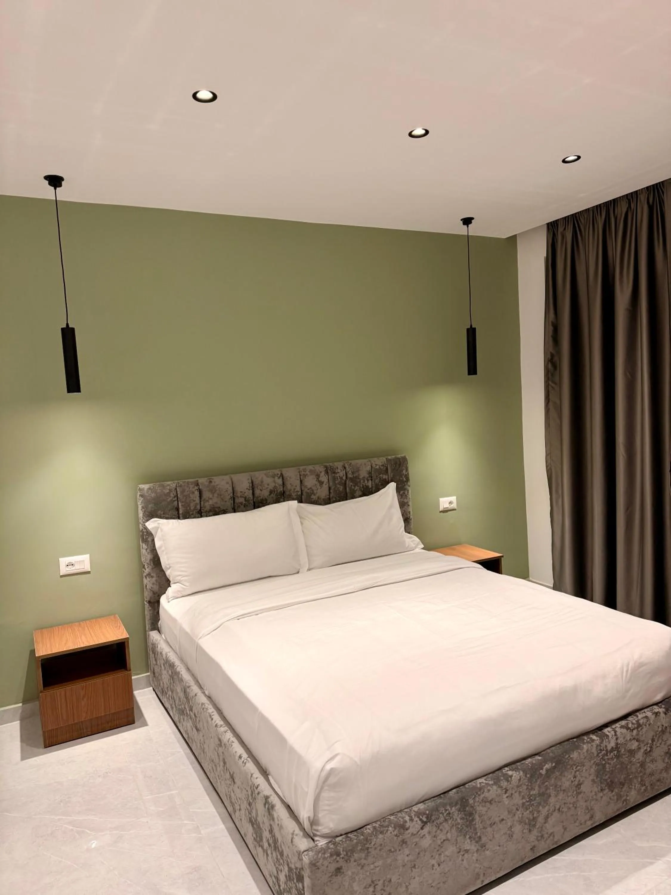 Bed in VILA ALIZEE Hotel