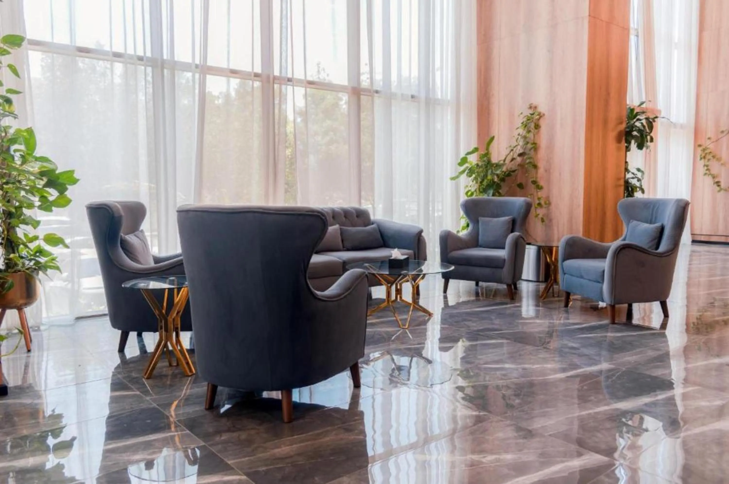 Seating area in Palette Luxury MAS Hotel