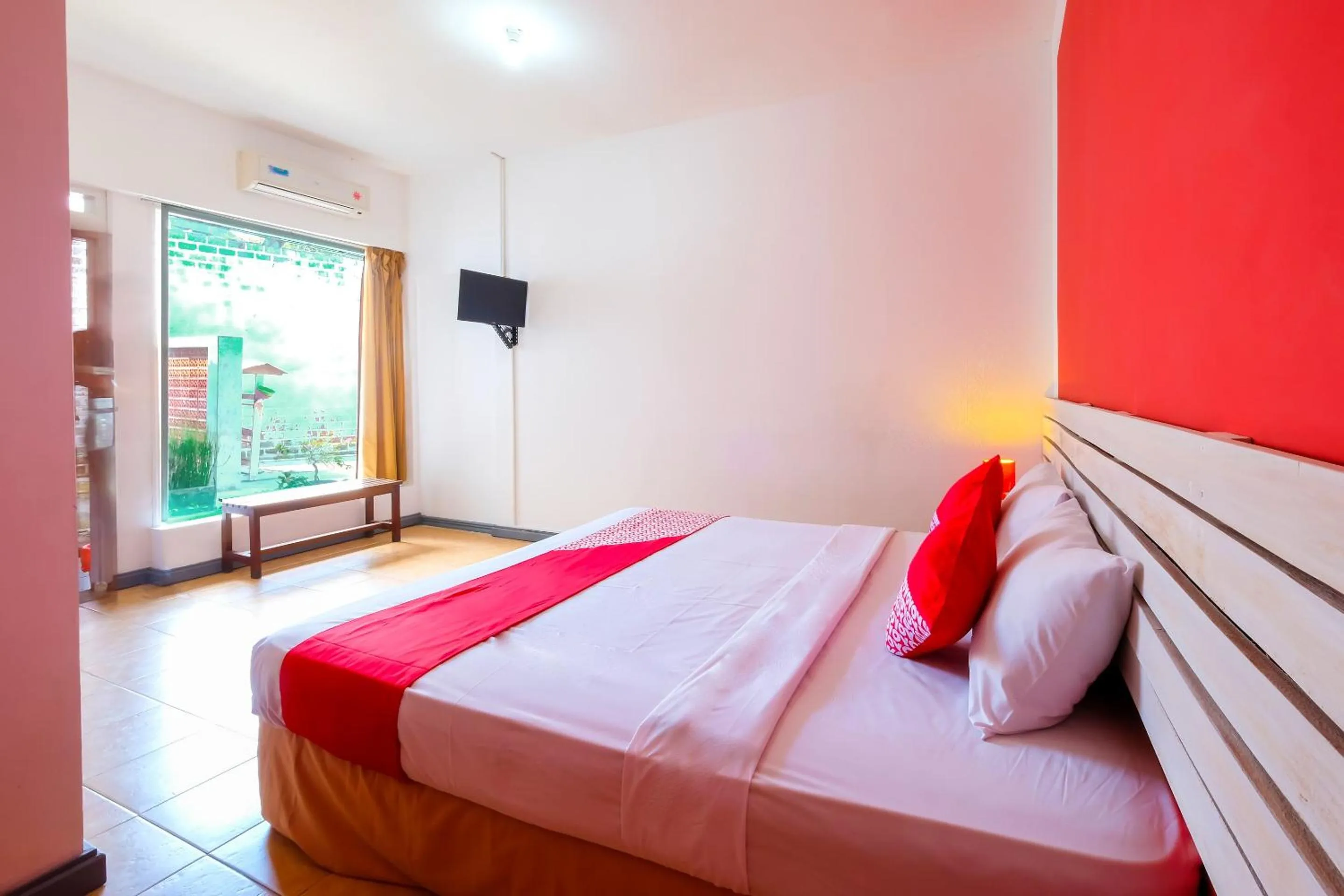 Bedroom in OYO 1206 Lombok Guest House