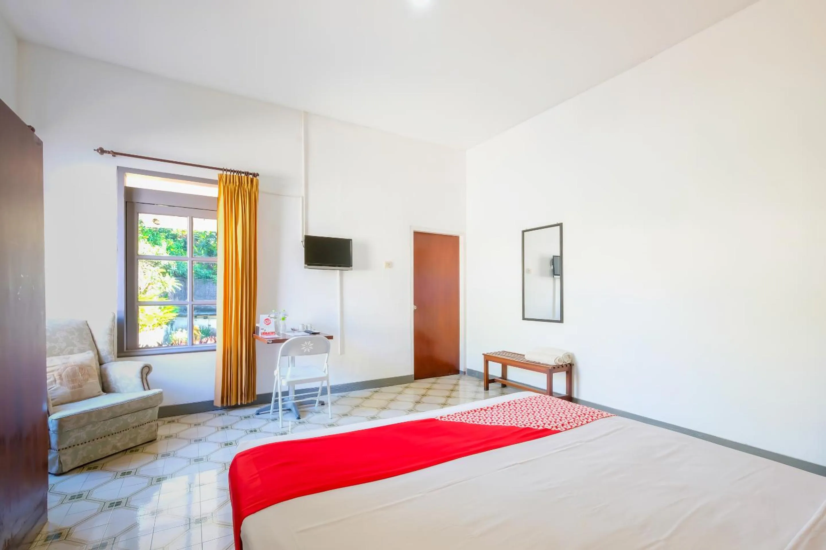 Bedroom in OYO 1206 Lombok Guest House