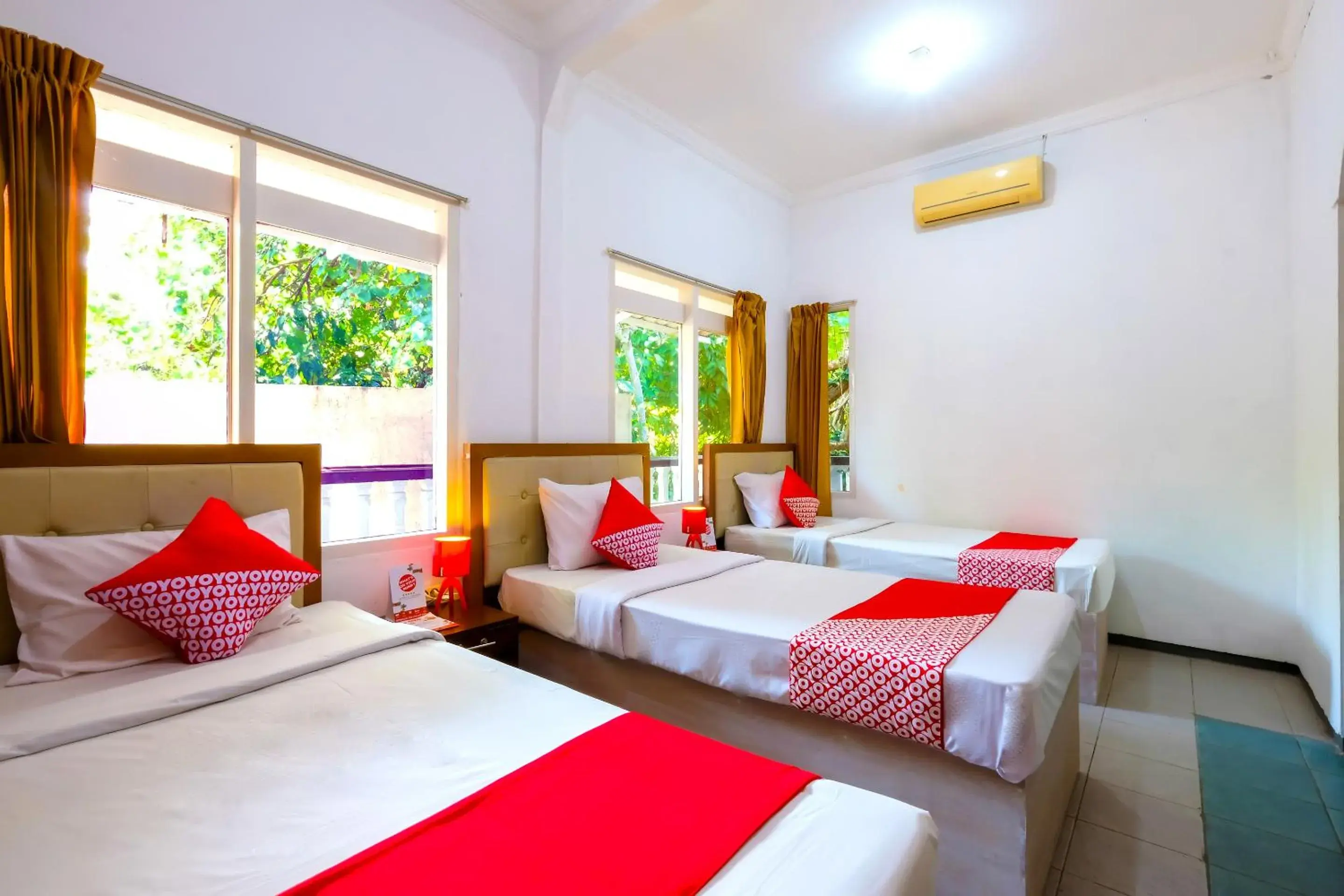 Bedroom in OYO 1206 Lombok Guest House
