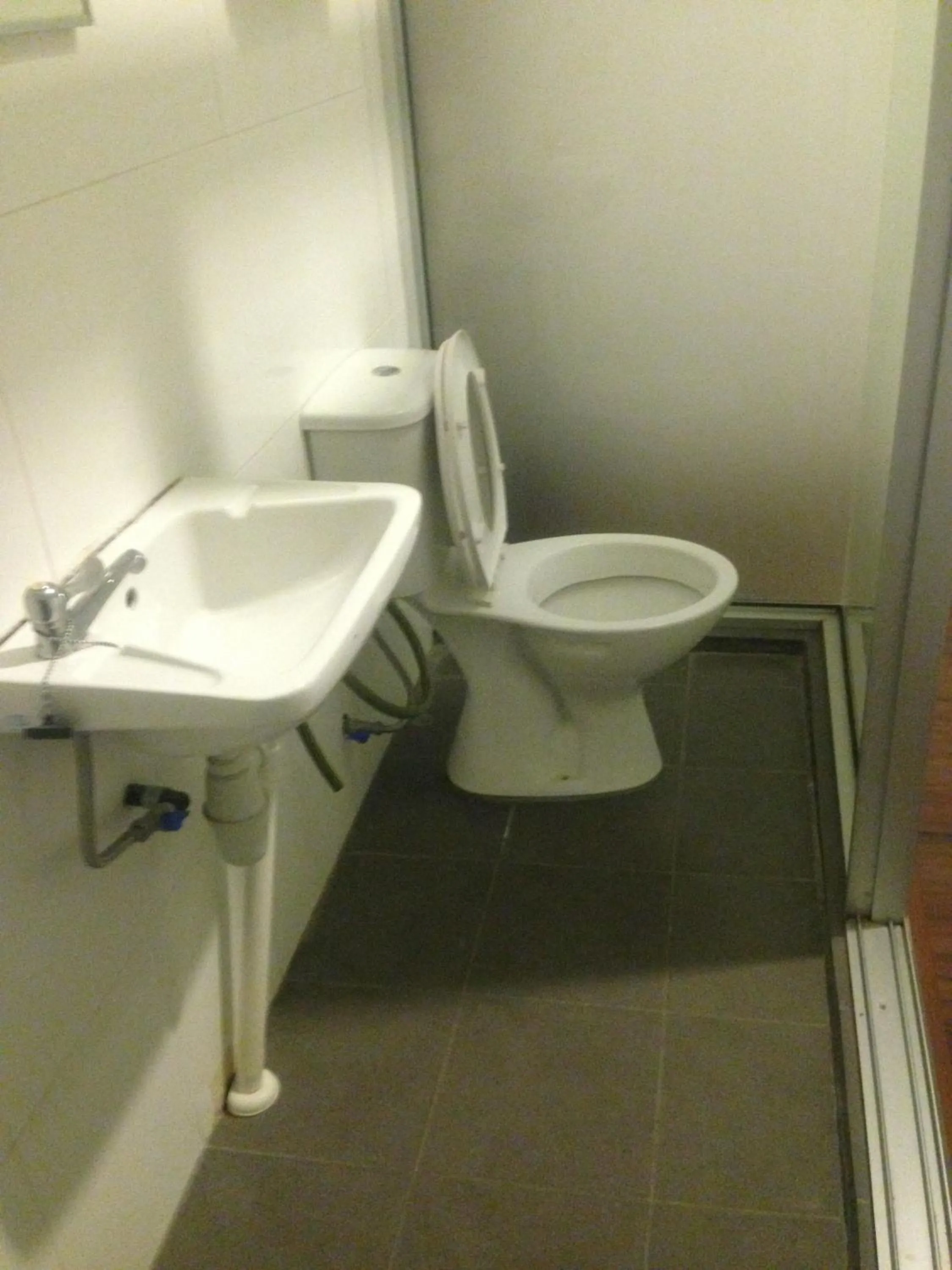 Toilet in Woodpecker Lodge, Kuching