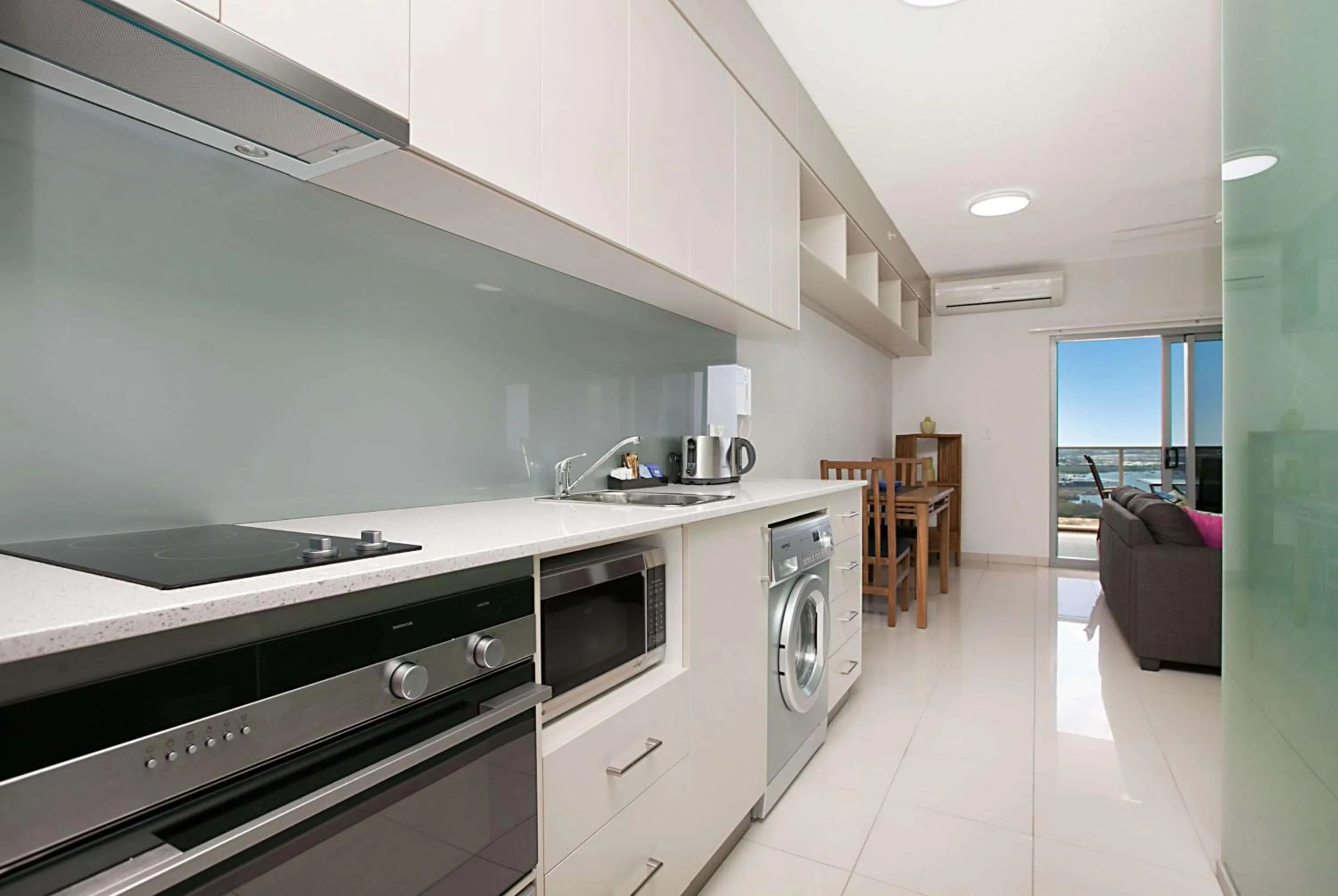 Kitchen or kitchenette in Ramada Suites by Wyndham Zen Quarter Darwin
