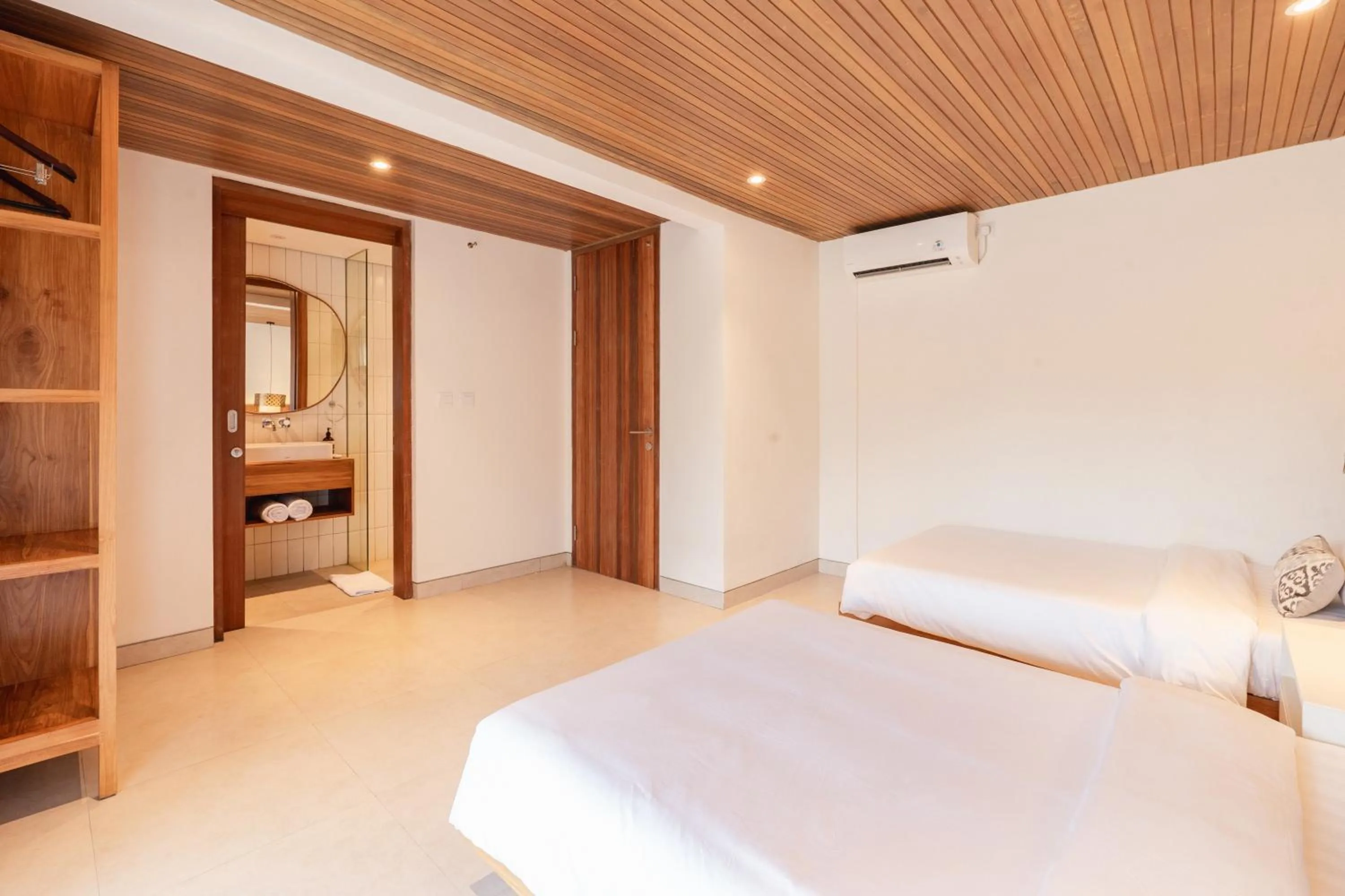 Bed in Villa Avocagolf Uluwatu by Nakula